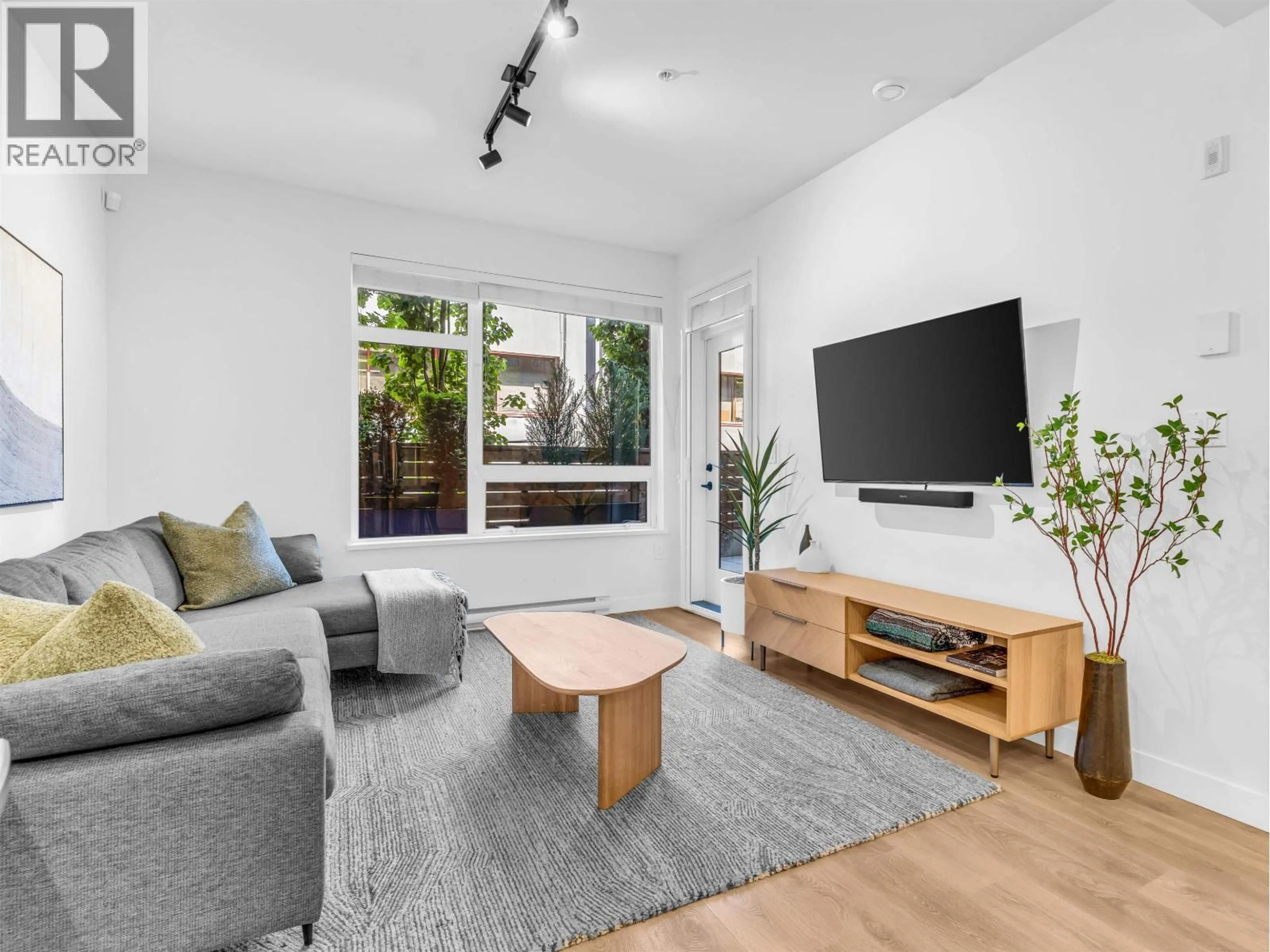 Living room with furniture, unknown for 104 - 3018 ST. GEORGE STREET, Port Moody British Columbia V3H0L4