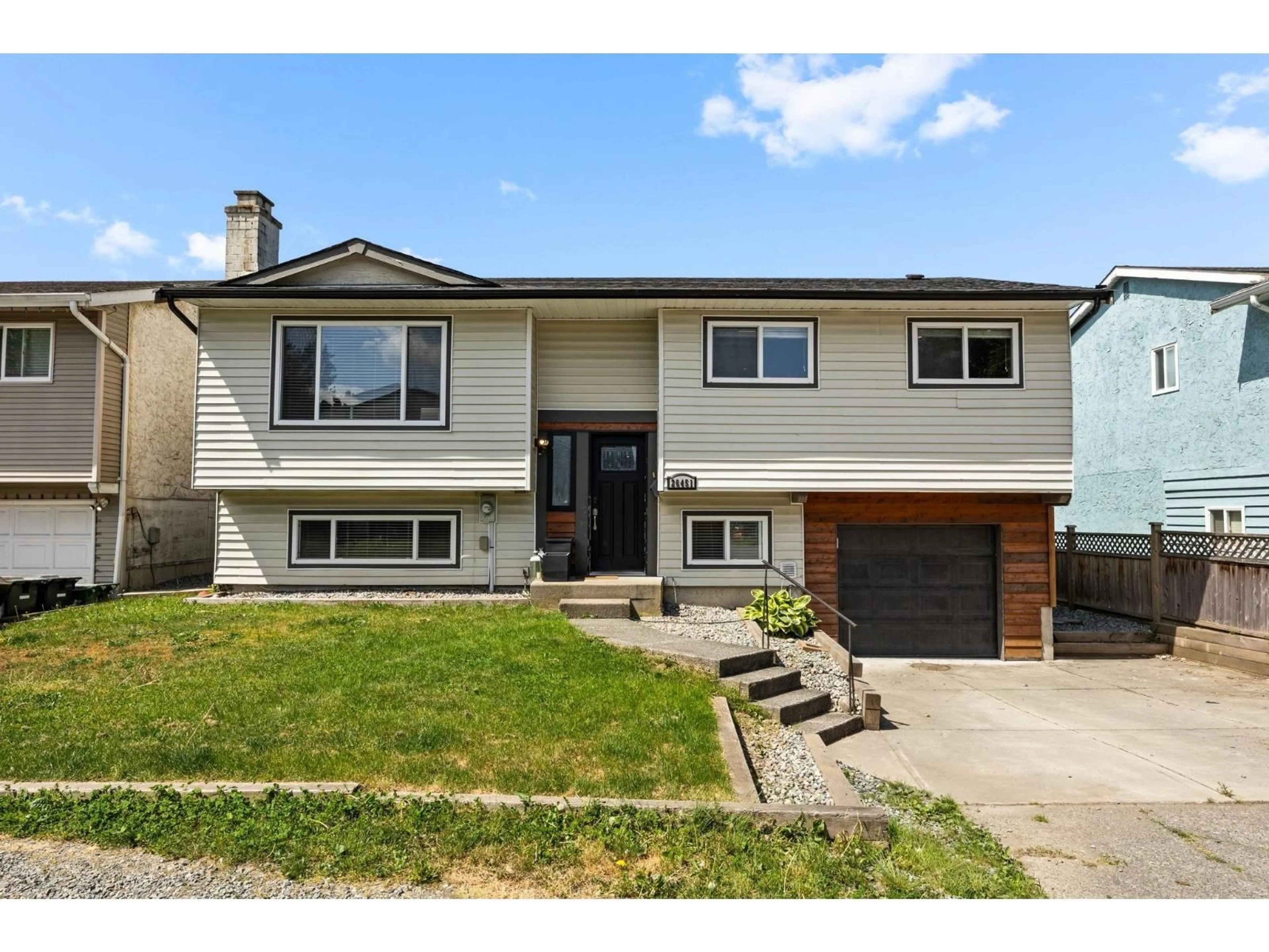 Home with vinyl exterior material, street for 26451 30A AVENUE, Langley British Columbia V4W3E1