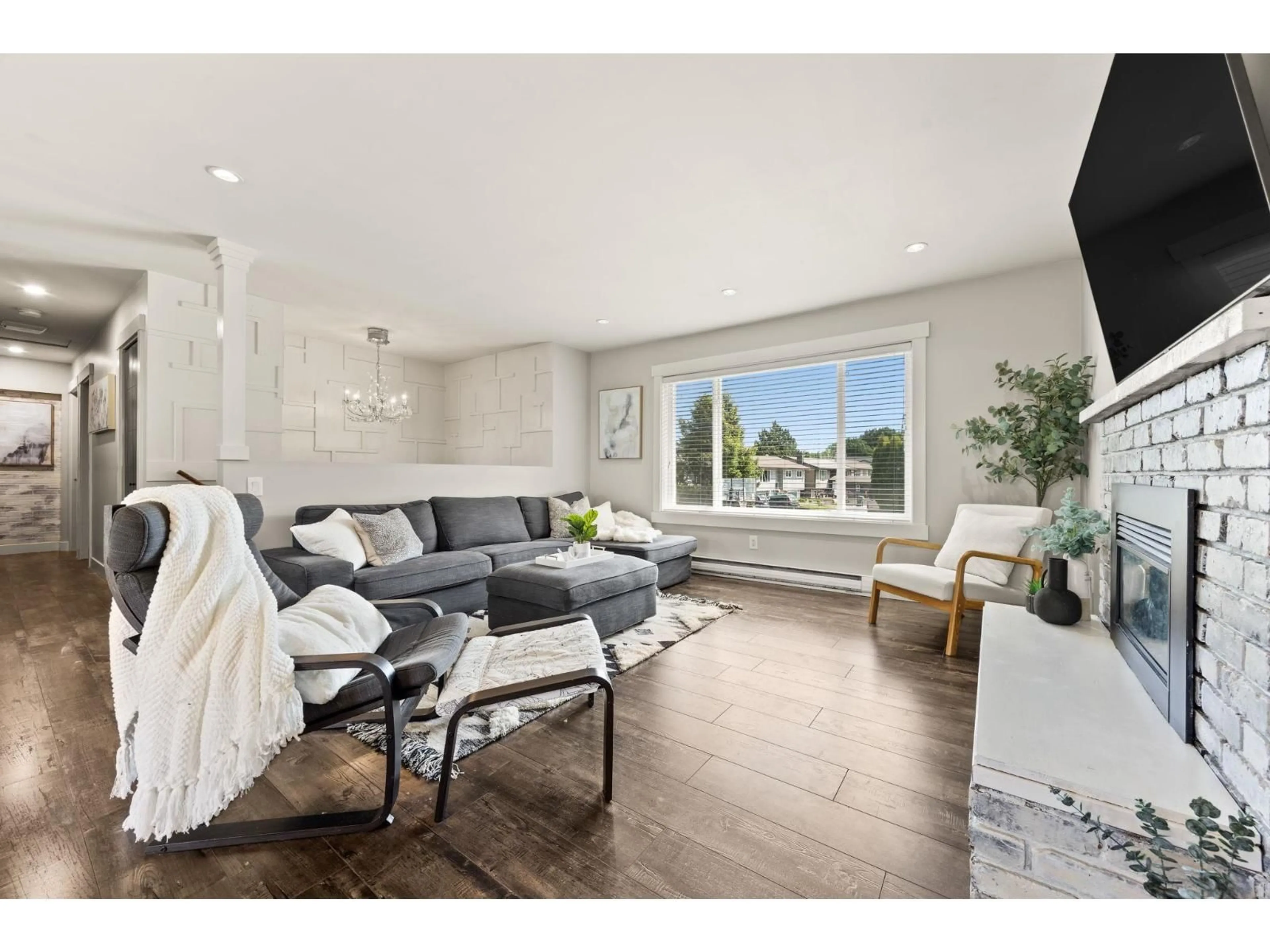 Living room with furniture, wood/laminate floor for 26451 30A AVENUE, Langley British Columbia V4W3E1