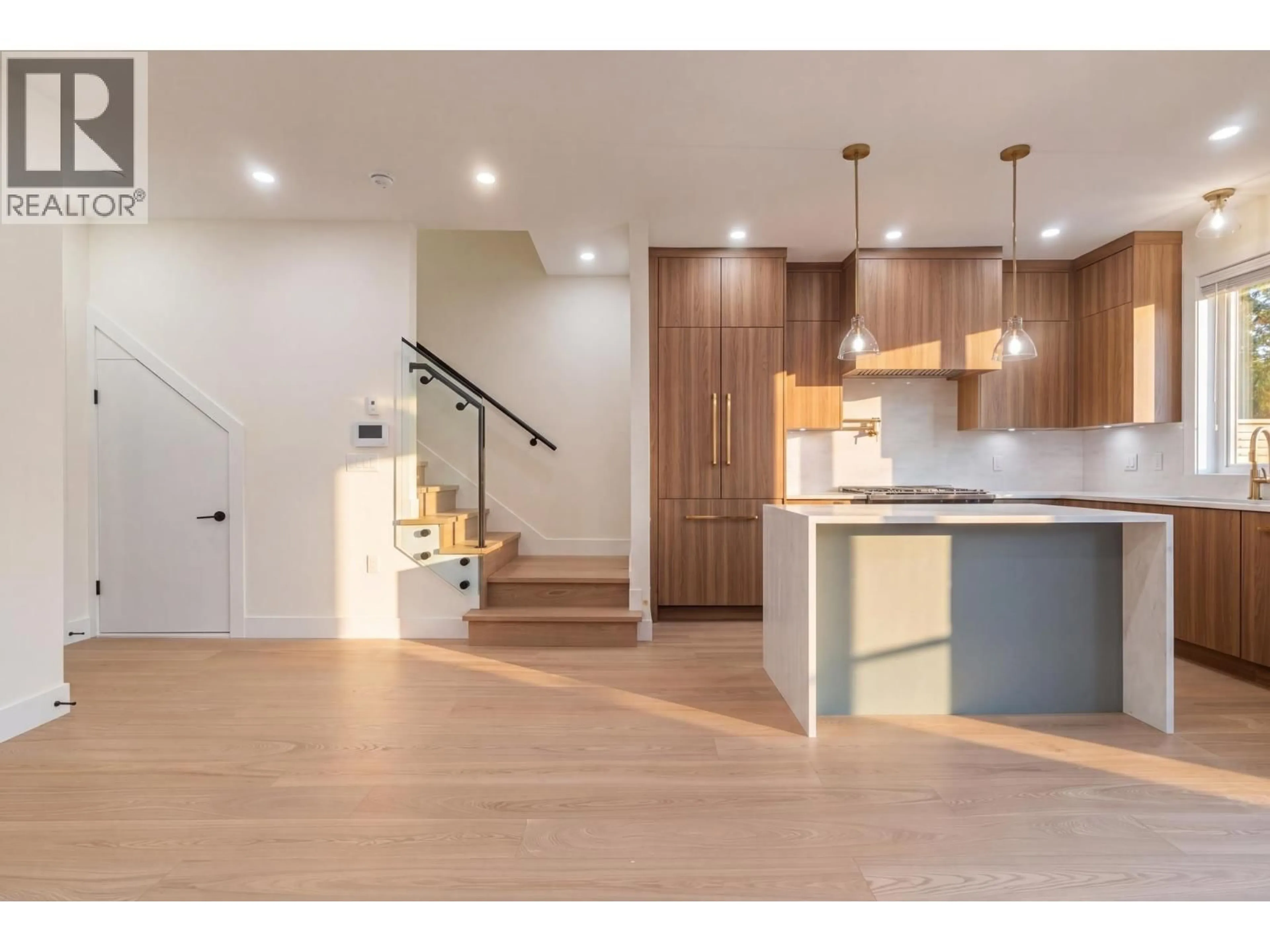 Open concept kitchen, wood/laminate floor for 2055 4TH AVENUE, Vancouver British Columbia V5N1K5