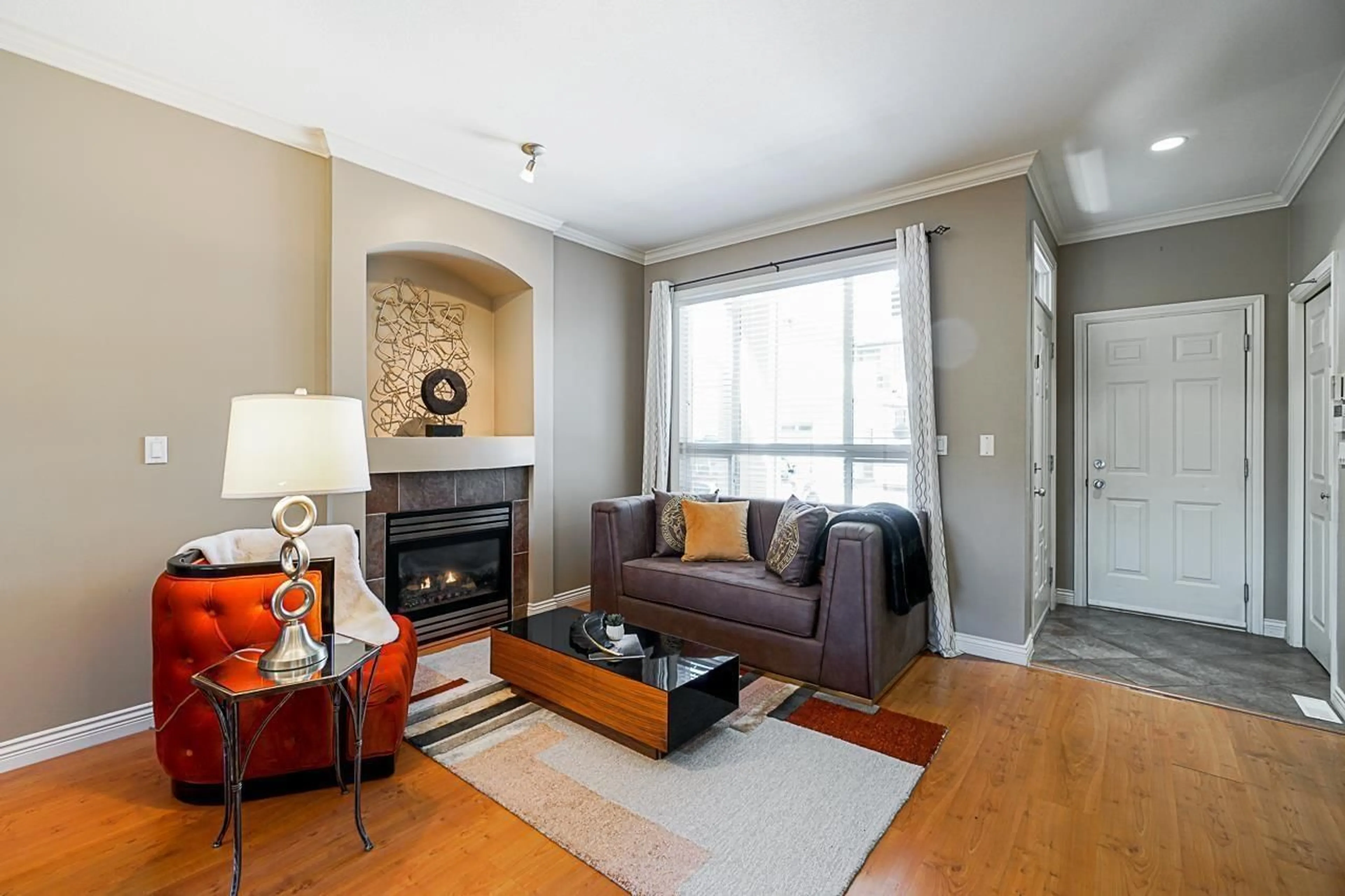 Living room with furniture, wood/laminate floor for 11 - 15168 66A AVENUE, Surrey British Columbia V3S1X2