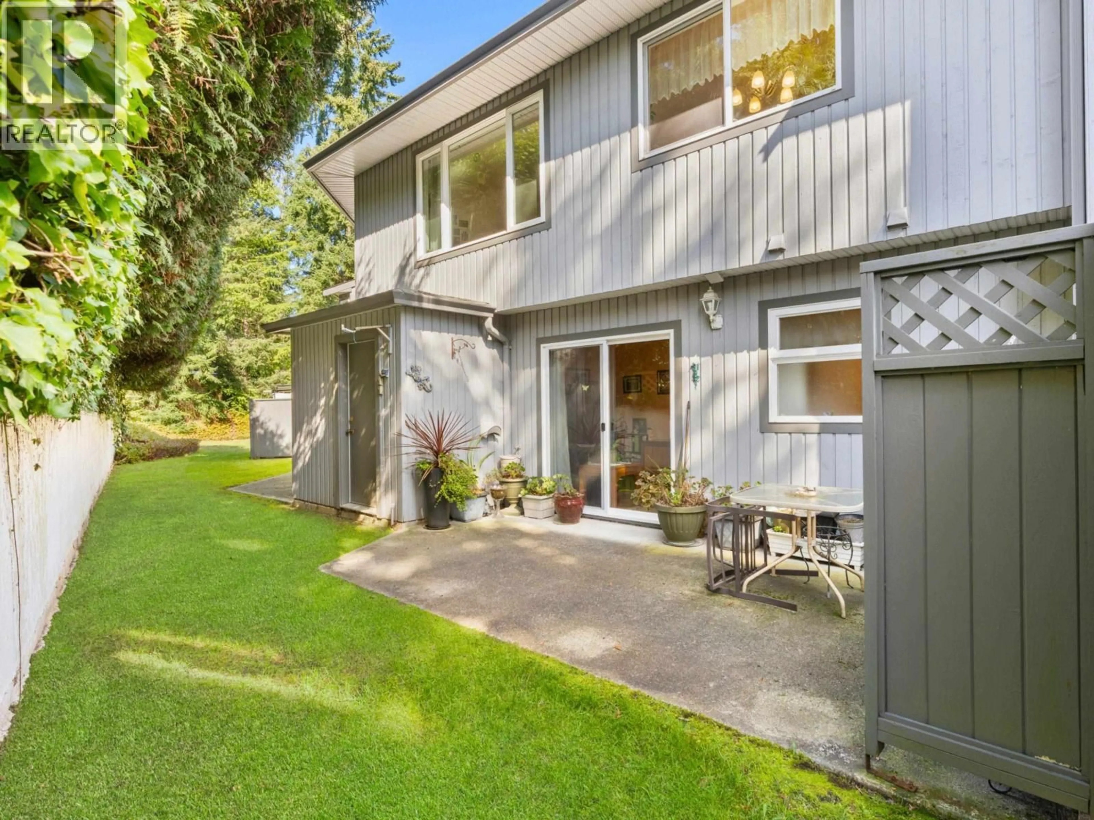 A pic from outside/outdoor area/front of a property/back of a property/a pic from drone, street for 38 - 5761 WHARF AVENUE, Sechelt British Columbia V0N3A0