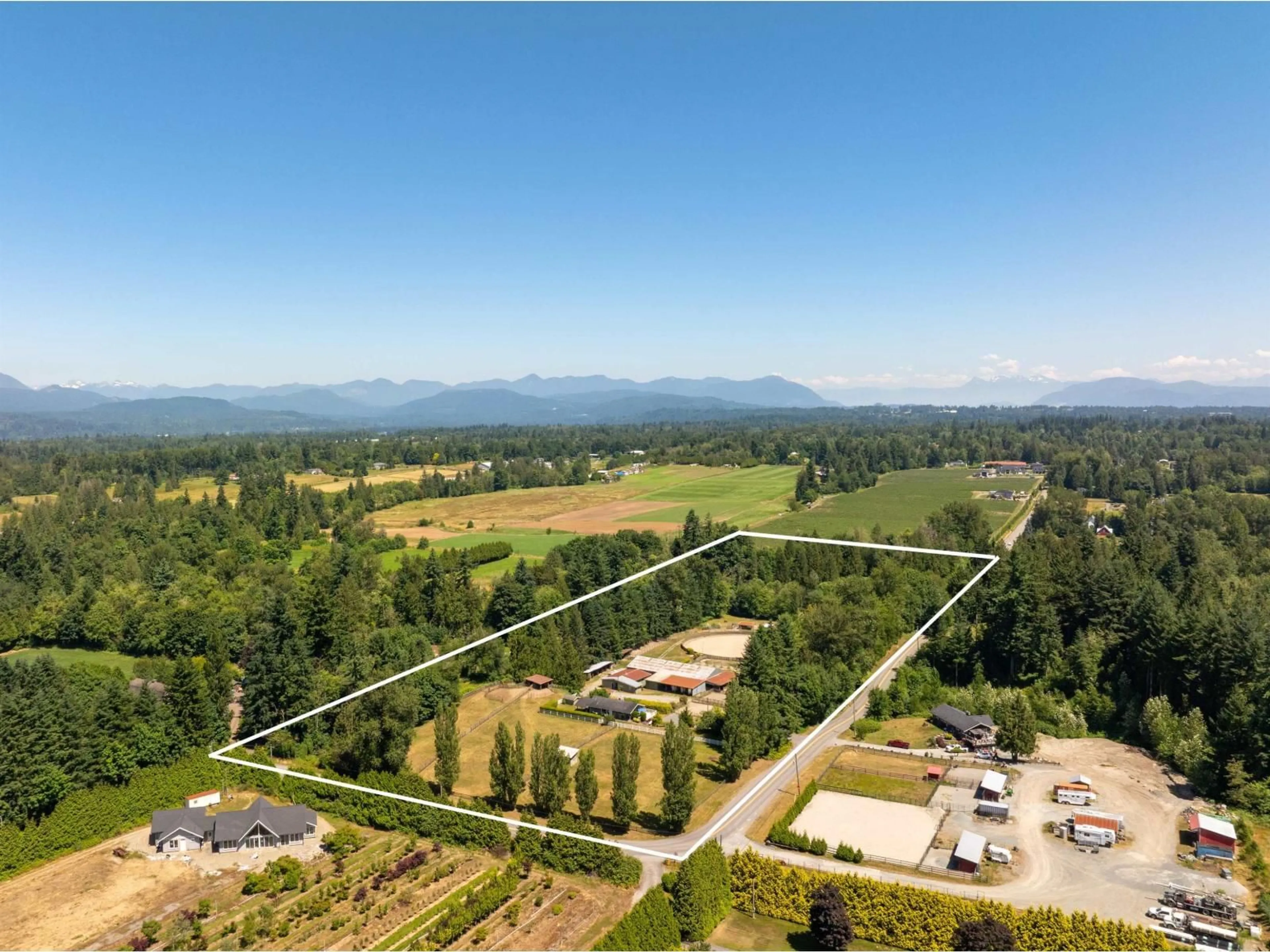 A pic from outside/outdoor area/front of a property/back of a property/a pic from drone, mountain view for 25177 64 AVENUE, Langley British Columbia V4W1H5