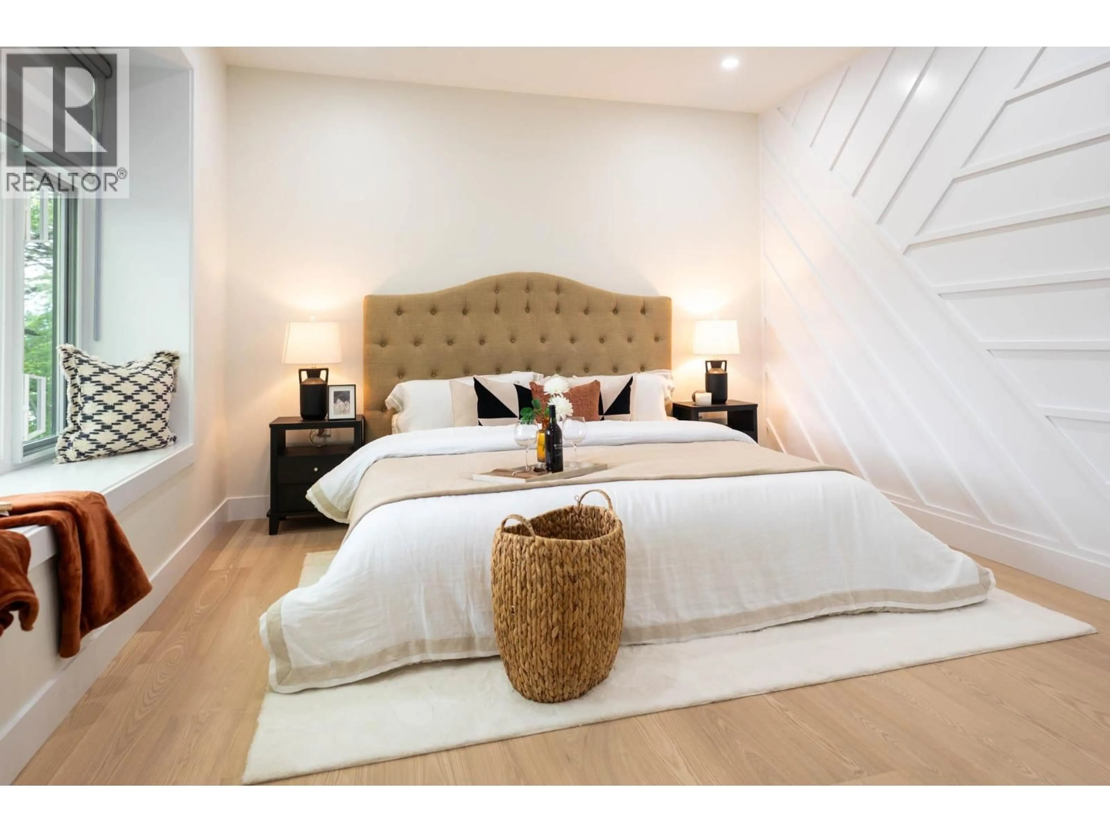 Bedroom with bed, wood/laminate floor for 4874-A LANARK STREET, Vancouver British Columbia V5N3S2
