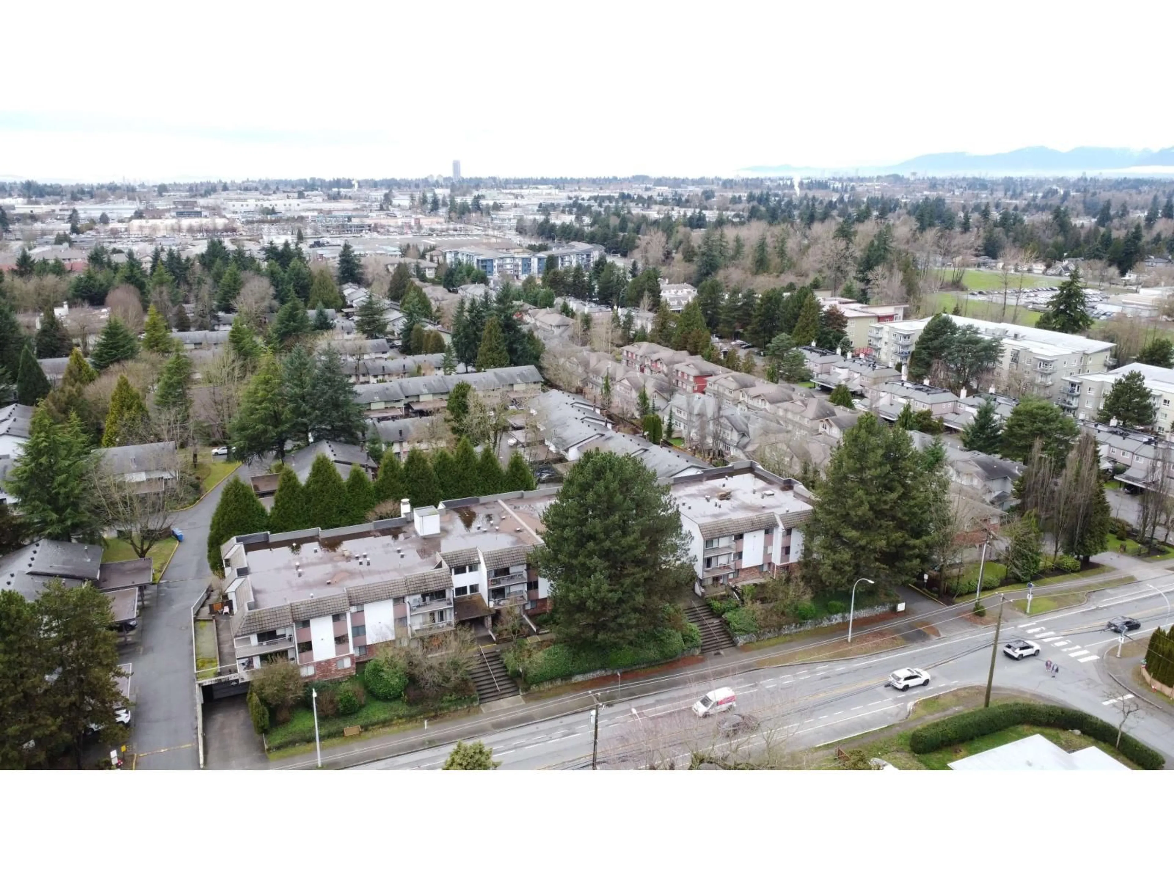 A pic from outside/outdoor area/front of a property/back of a property/a pic from drone, unknown for 202 - 7473 140 STREET, Surrey British Columbia V3W6G5