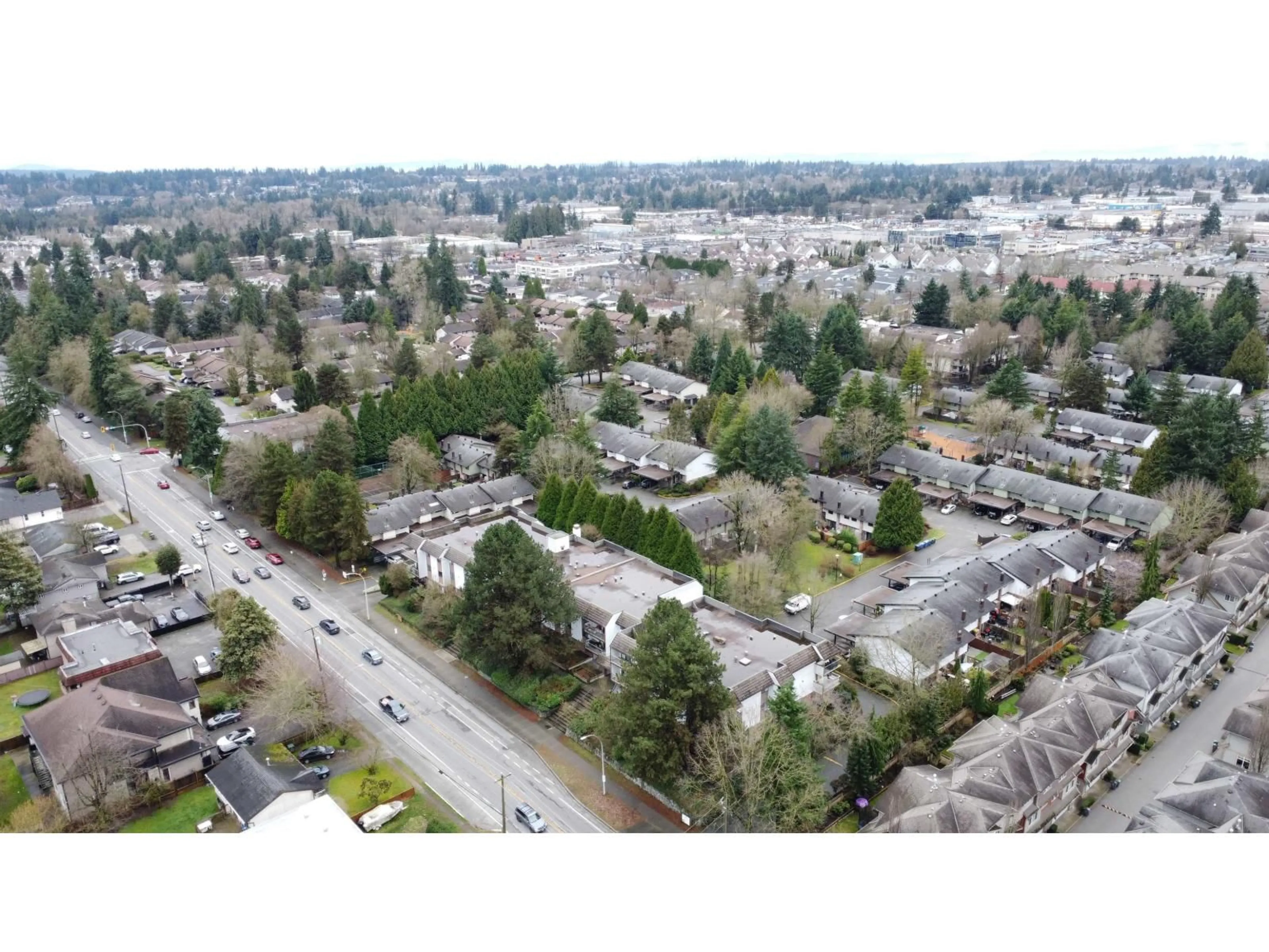 A pic from outside/outdoor area/front of a property/back of a property/a pic from drone, unknown for 202 - 7473 140 STREET, Surrey British Columbia V3W6G5