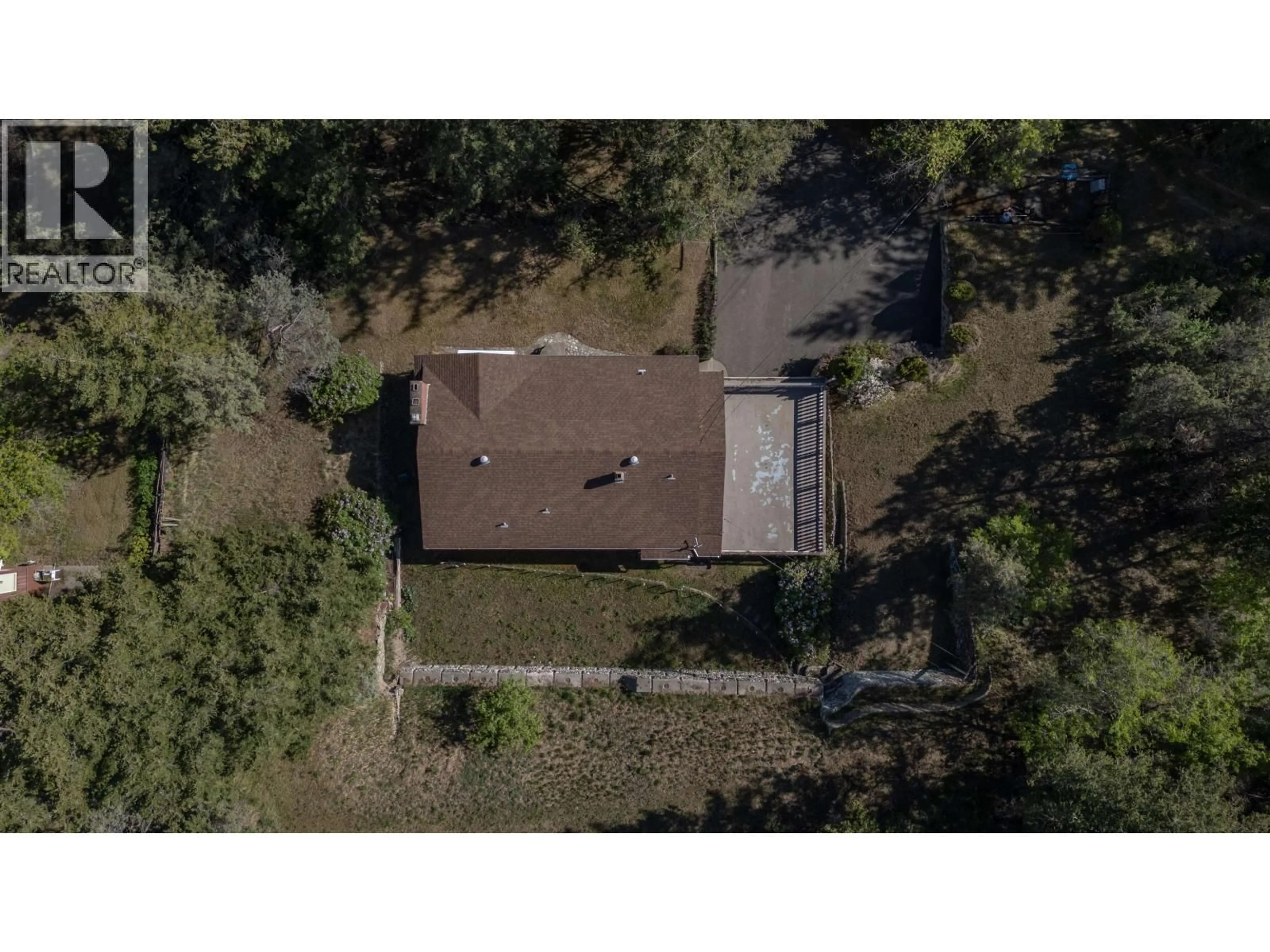 A pic from outside/outdoor area/front of a property/back of a property/a pic from drone, unknown for 2038 WHITE ROAD, Williams Lake British Columbia V2G5G9