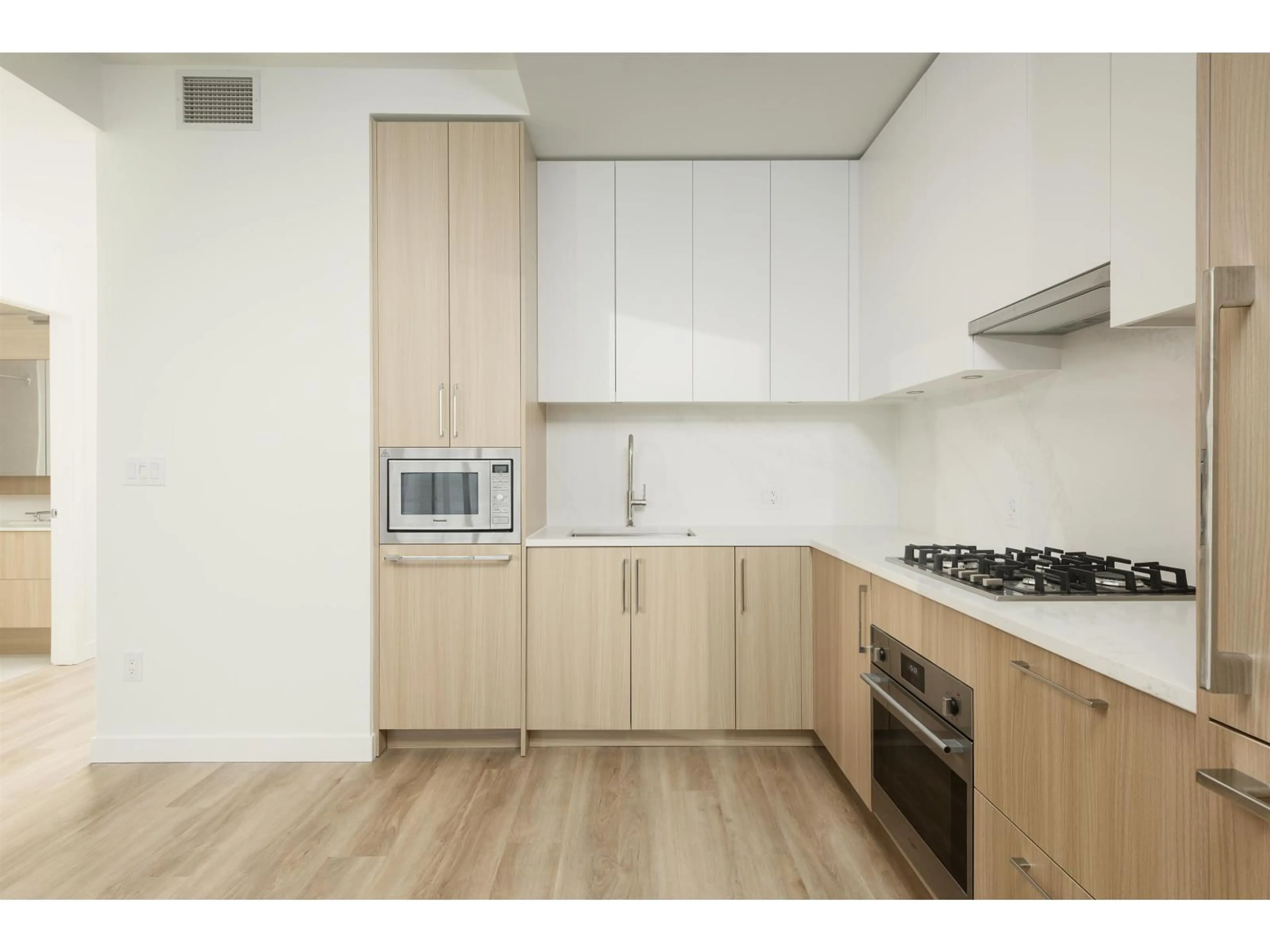 Standard kitchen, wood/laminate floor for 202 - 9675 KING GEORGE BOULEVARD, Surrey British Columbia V3T0T7