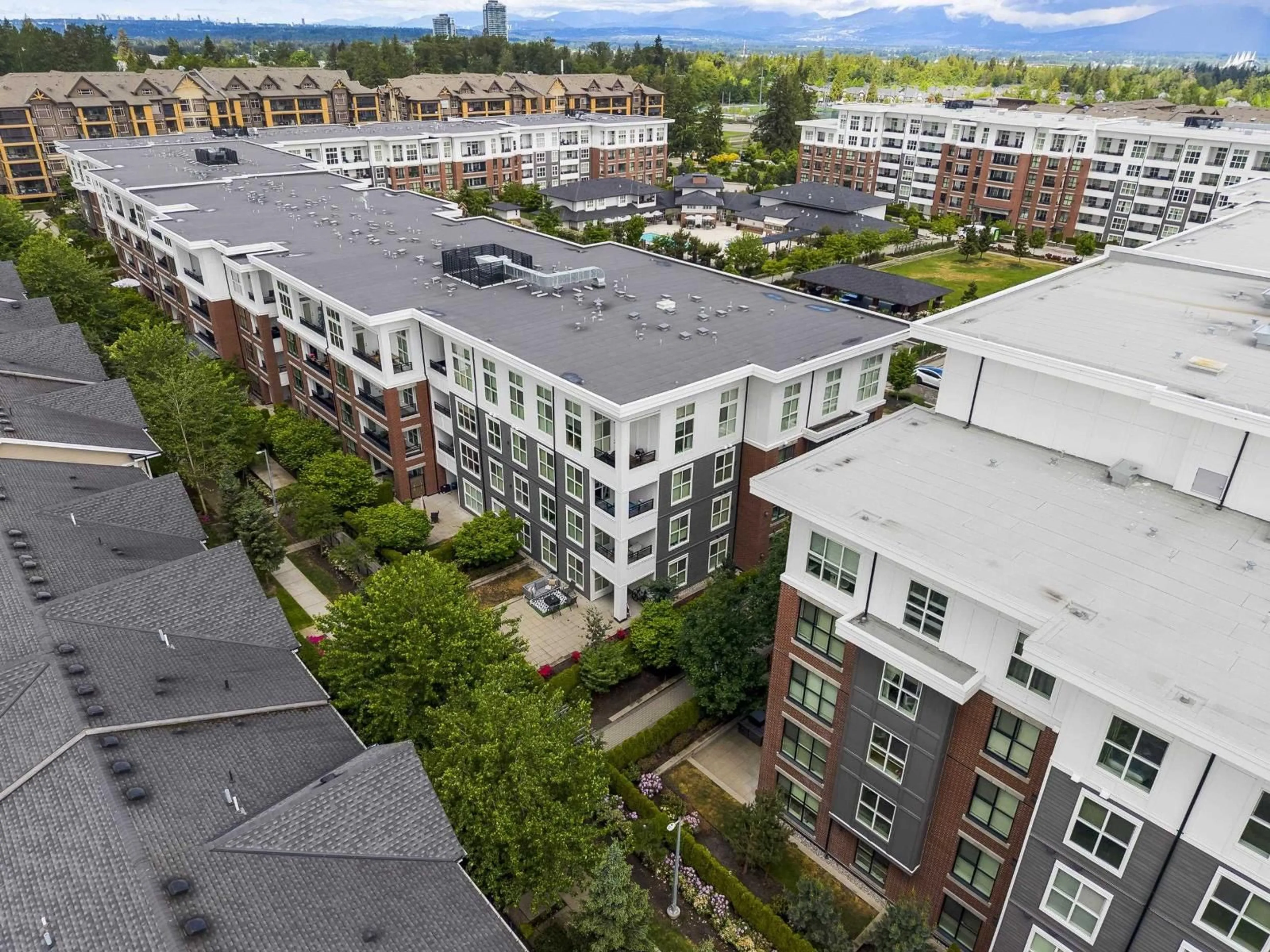 A pic from outside/outdoor area/front of a property/back of a property/a pic from drone, city buildings view from balcony for D107 - 8150 207 STREET, Langley British Columbia V2Y4J5