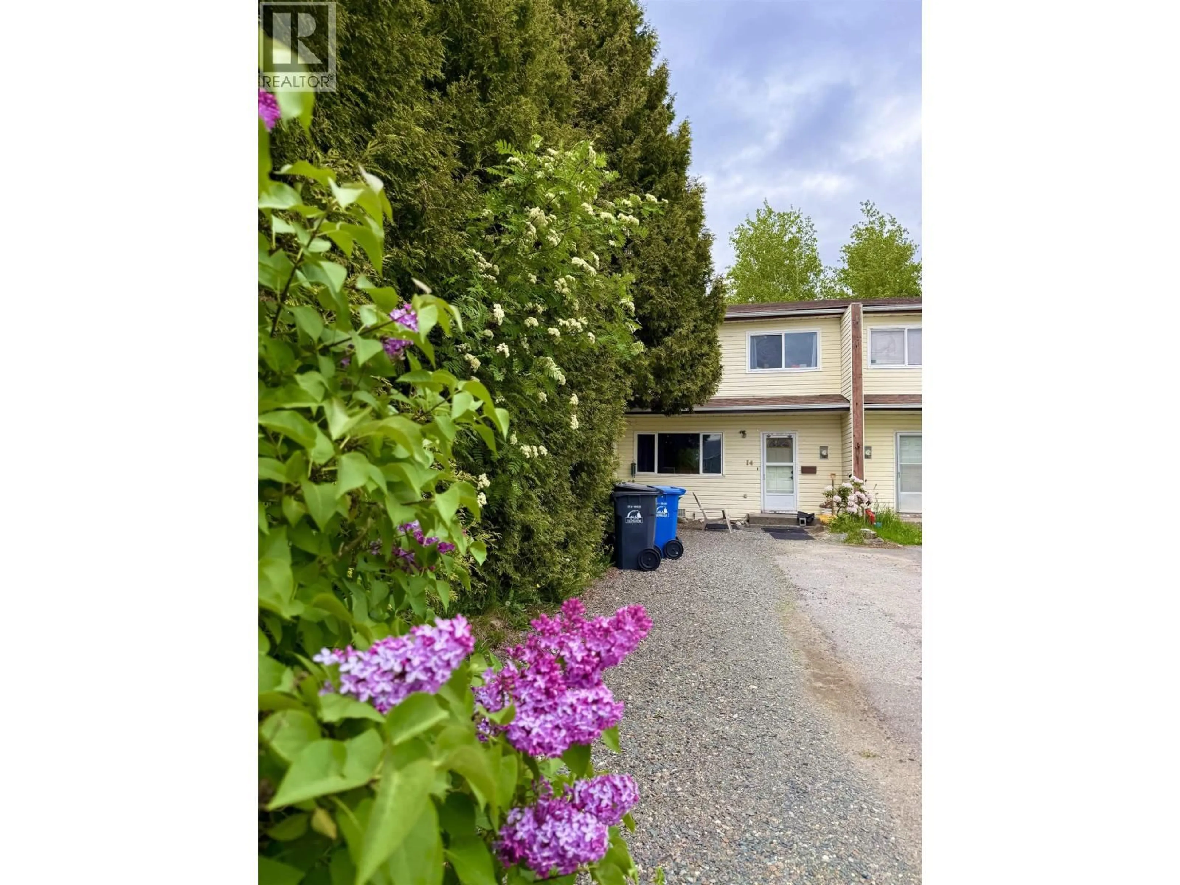 A pic from outside/outdoor area/front of a property/back of a property/a pic from drone, street for 14 - 4714 DAVIS AVENUE, Terrace British Columbia V8G1X9