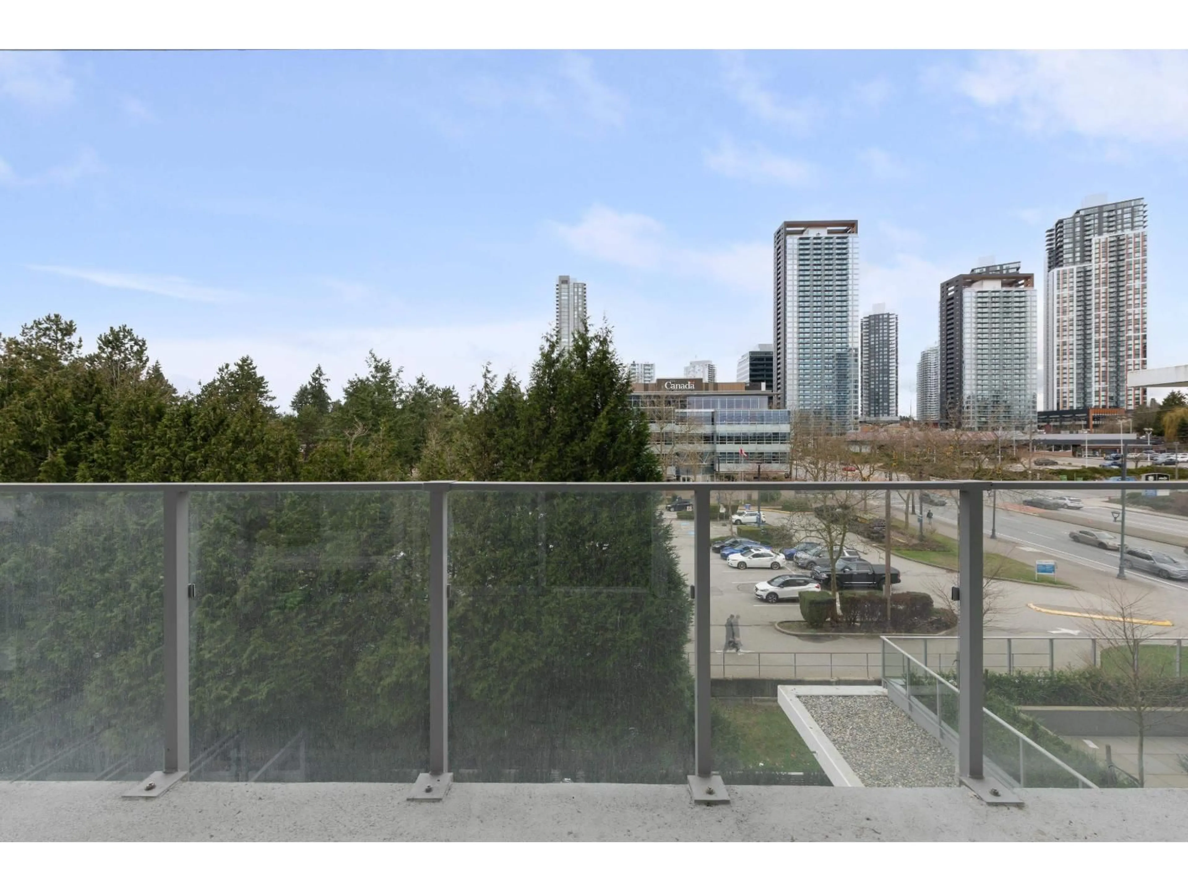Balcony in the apartment, city buildings view from balcony for 416 - 9675 KING GEORGE BOULEVARD, Surrey British Columbia V3T0T7