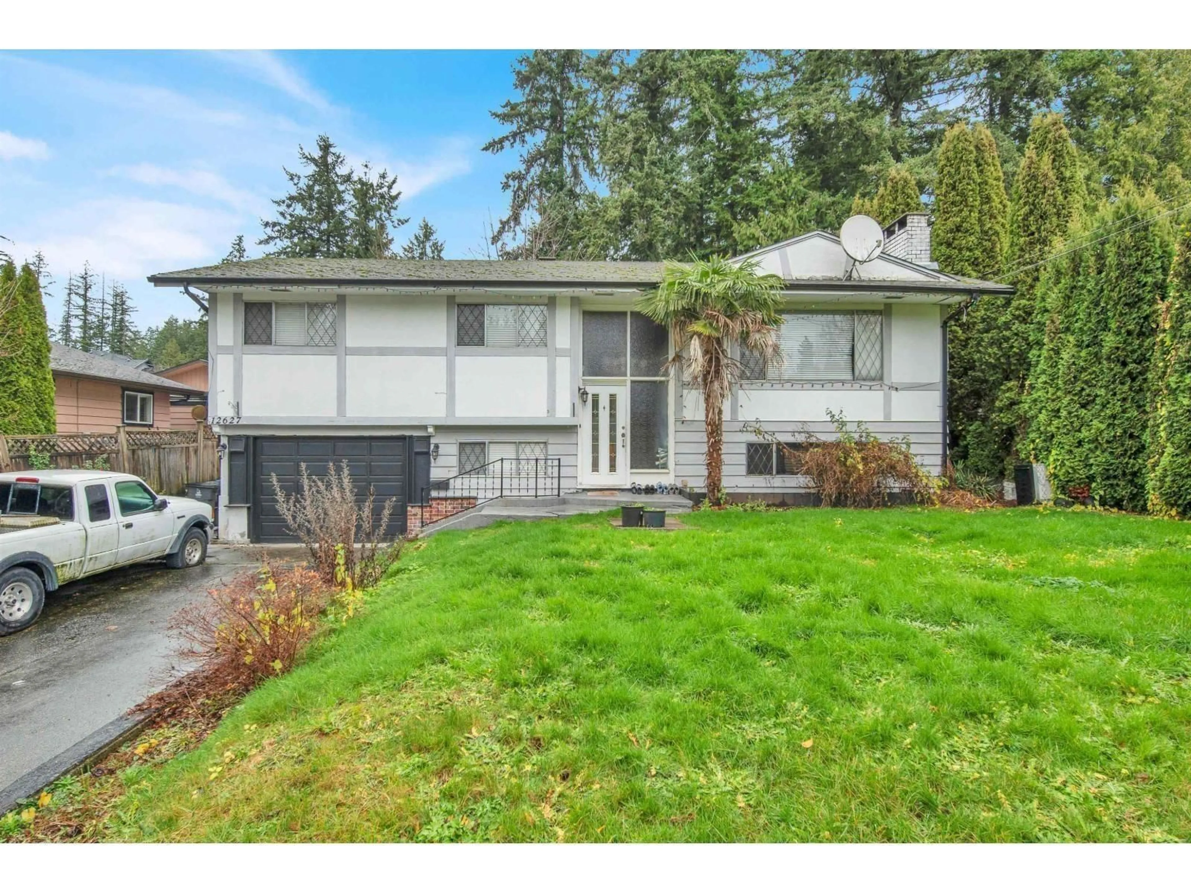 Home with vinyl exterior material, street for 12627 58 AVENUE, Surrey British Columbia V3X2P5