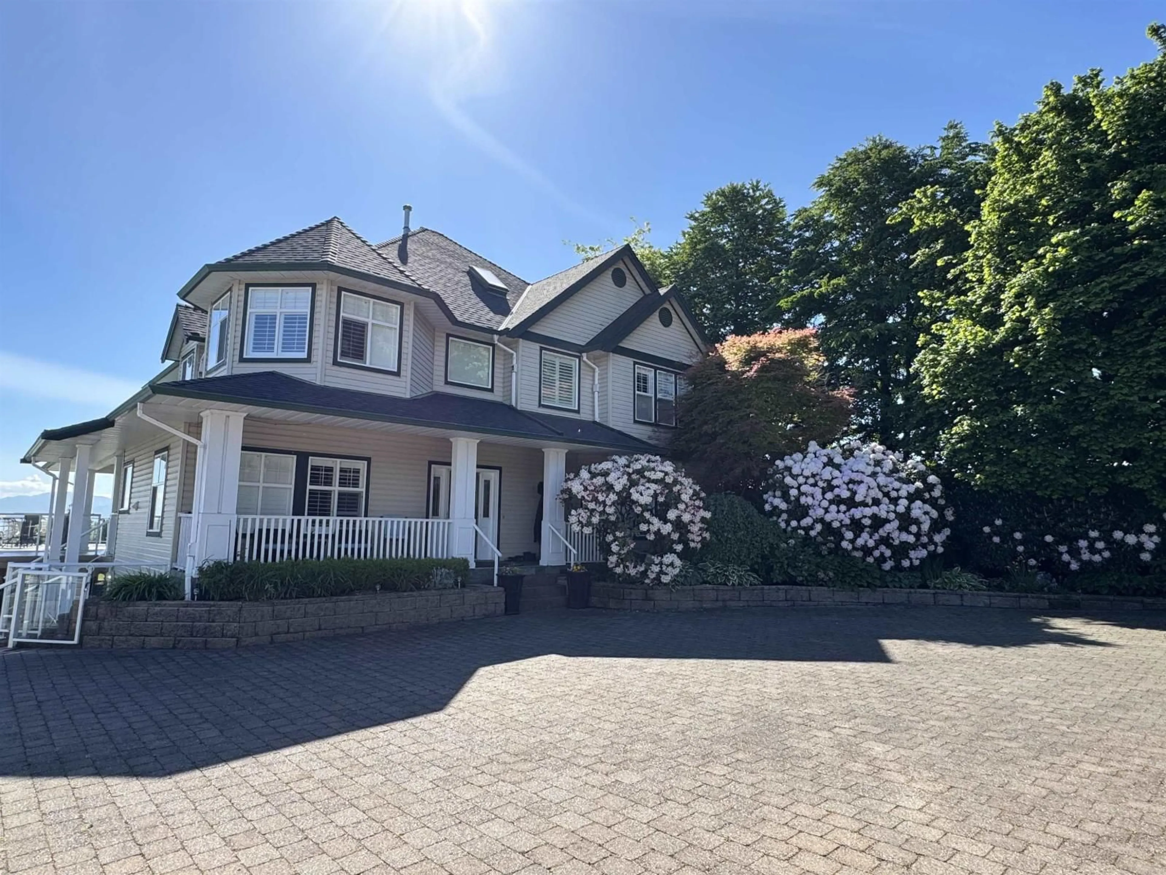 A pic from outside/outdoor area/front of a property/back of a property/a pic from drone, street for 7064 SATCHELL STREET, Abbotsford British Columbia V4X2E3