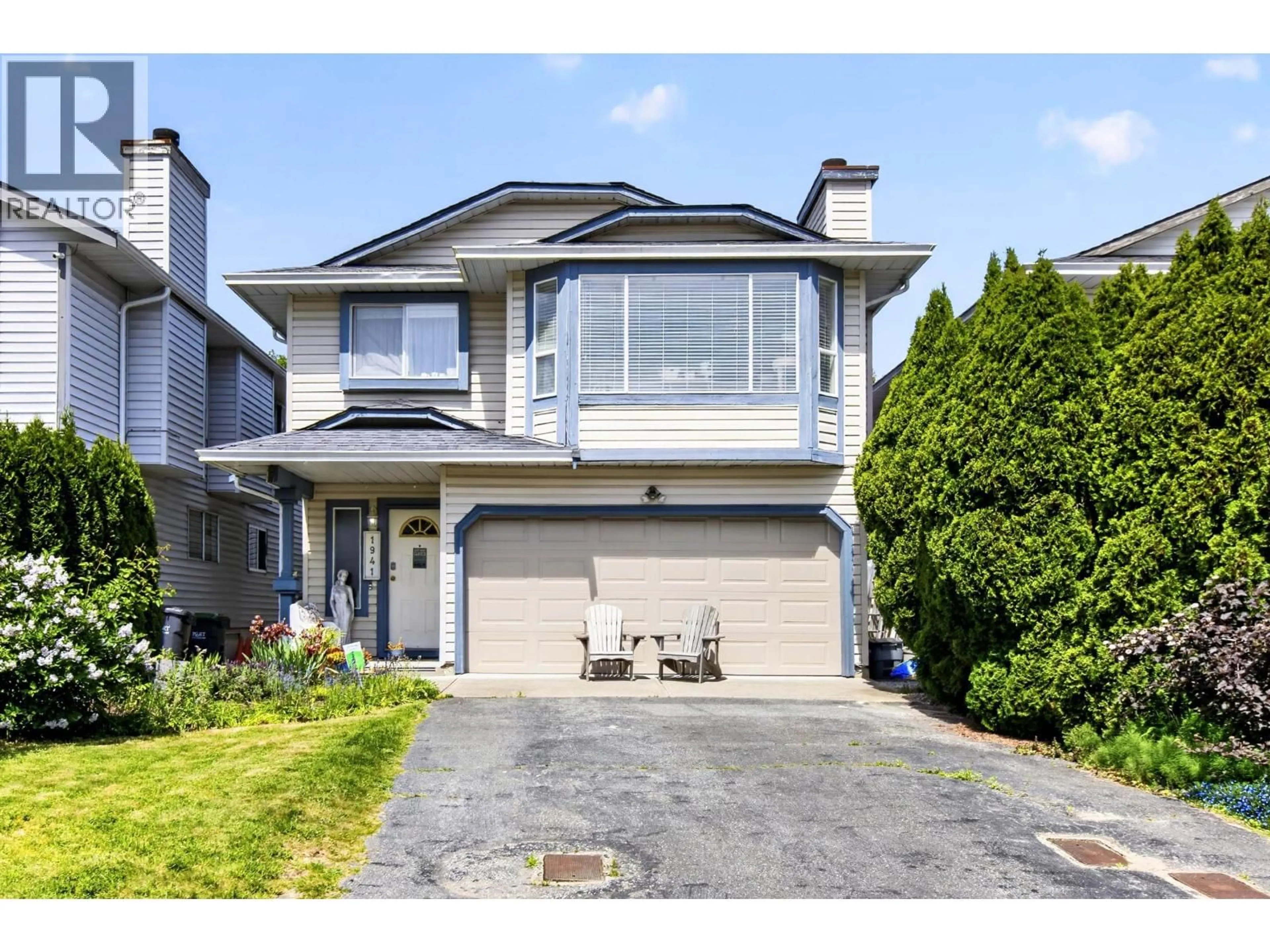 Home with vinyl exterior material, street for 1941 LANGAN AVENUE, Port Coquitlam British Columbia V3C1L1