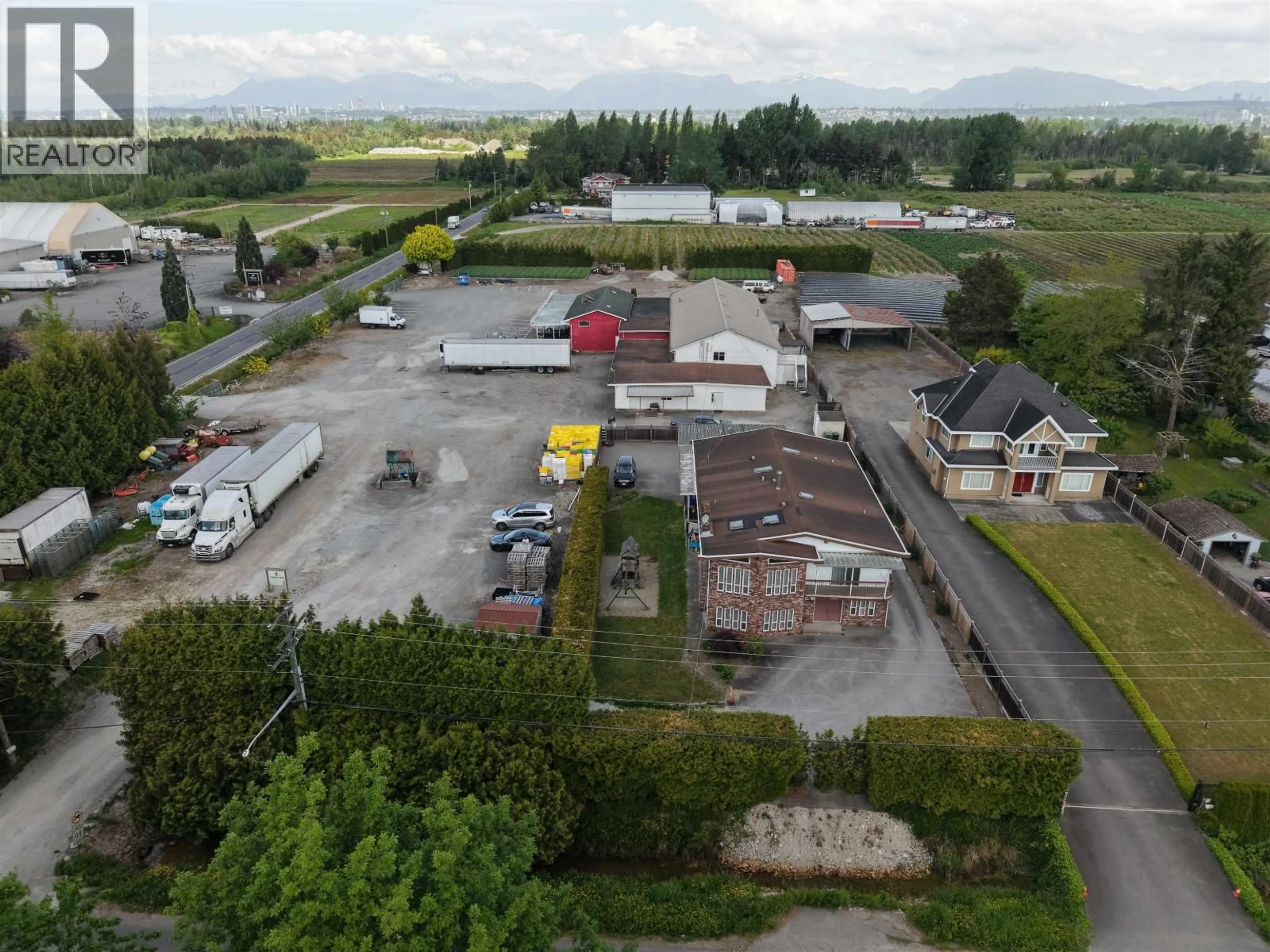 A pic from outside/outdoor area/front of a property/back of a property/a pic from drone, mountain view for 13051 BLUNDELL ROAD, Richmond British Columbia V6W1B6