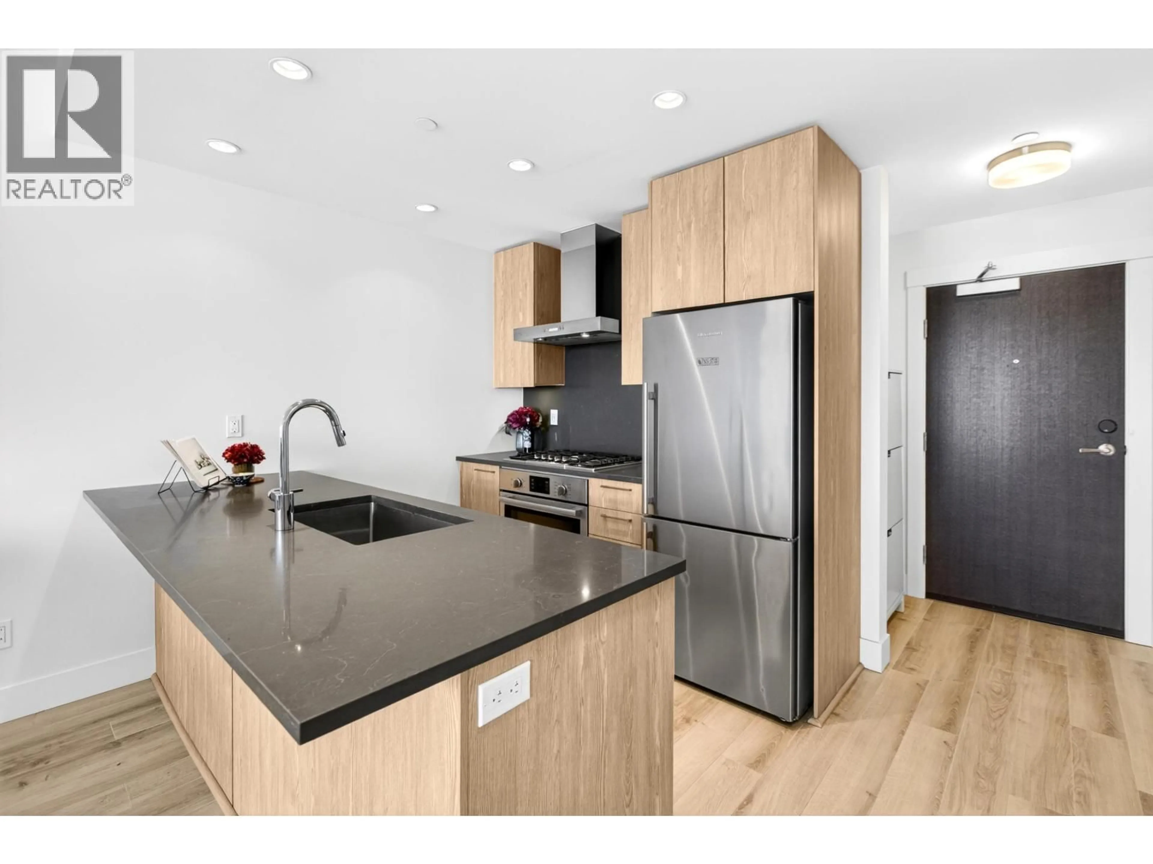 Open concept kitchen, wood/laminate floor for 510 - 10788 NO. 5 ROAD, Richmond British Columbia V6W0B7