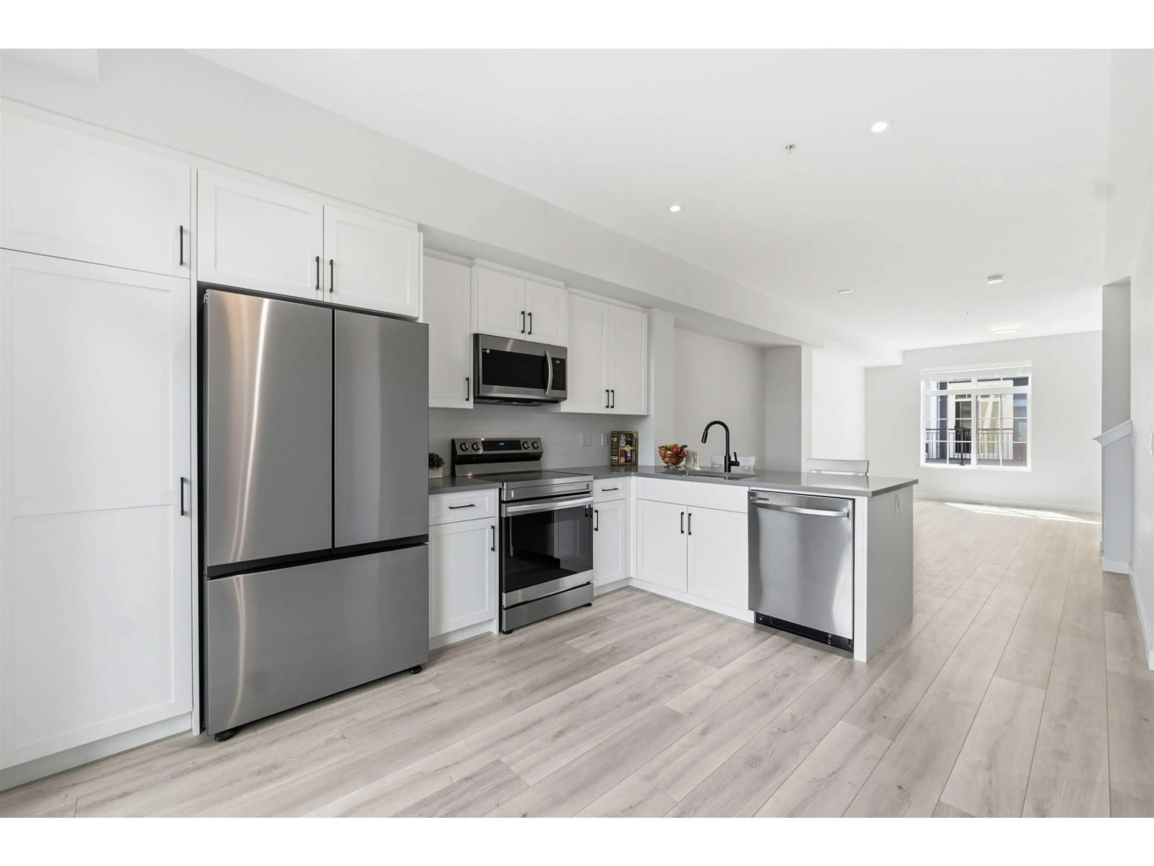 Open concept kitchen, unknown for 143 - 20180 84 AVENUE, Langley British Columbia V2Y3N5