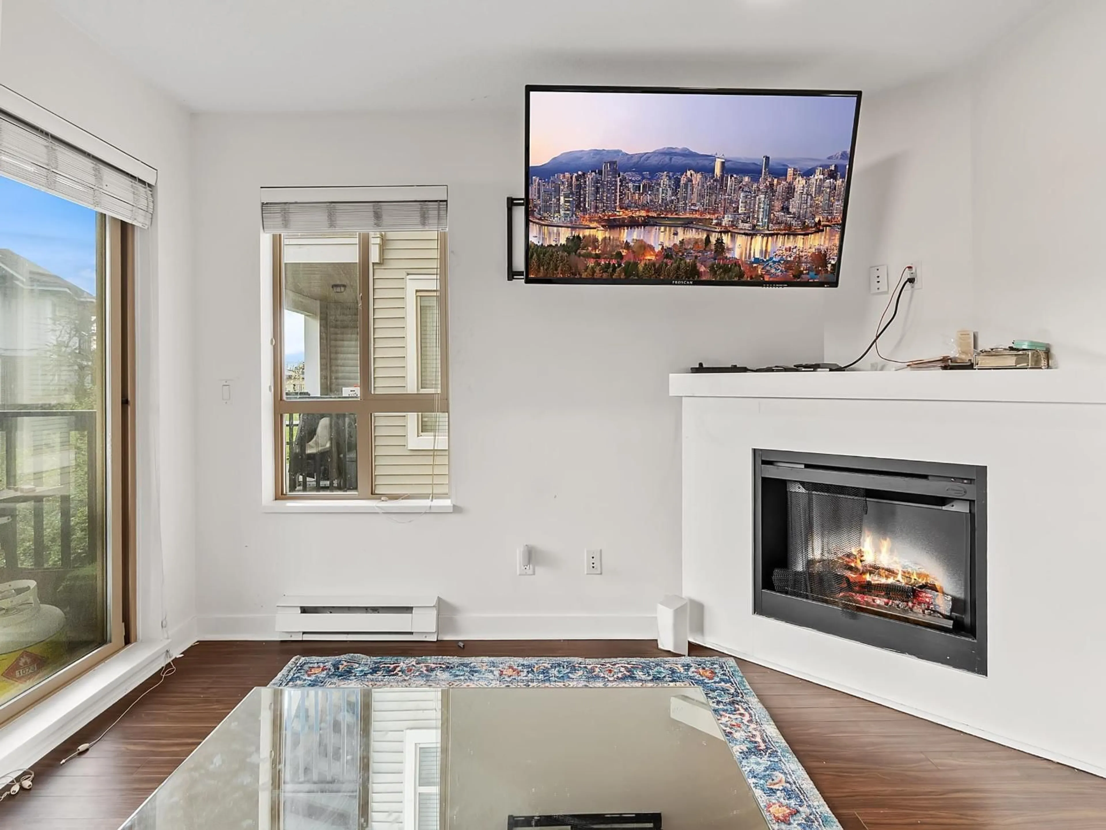 Living room with furniture, wood/laminate floor for 322 - 8915 202 STREET, Langley British Columbia V1M0B5