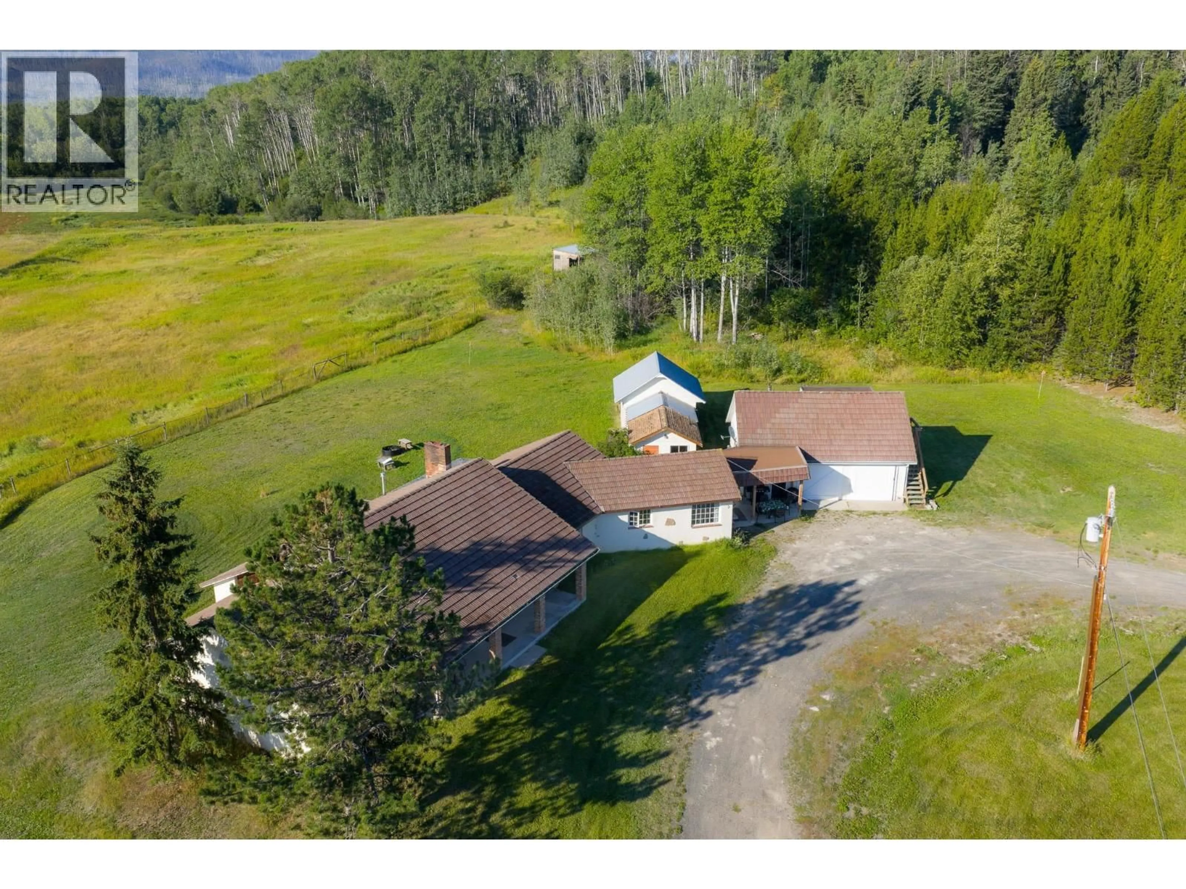 A pic from outside/outdoor area/front of a property/back of a property/a pic from drone, mountain view for 5343 NITHI ROAD, Fraser Lake British Columbia V0J1S0