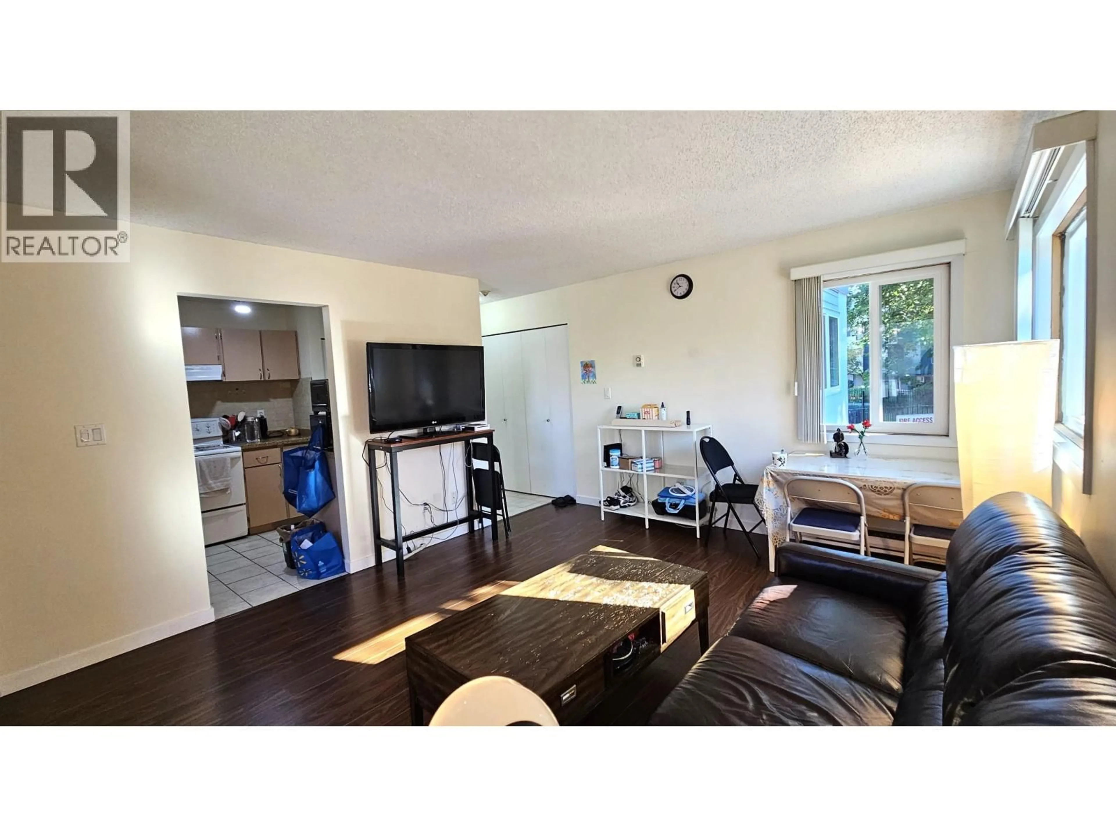 Living room with furniture, wood/laminate floor for 123 - 8700 ACKROYD ROAD, Richmond British Columbia V6X3G2