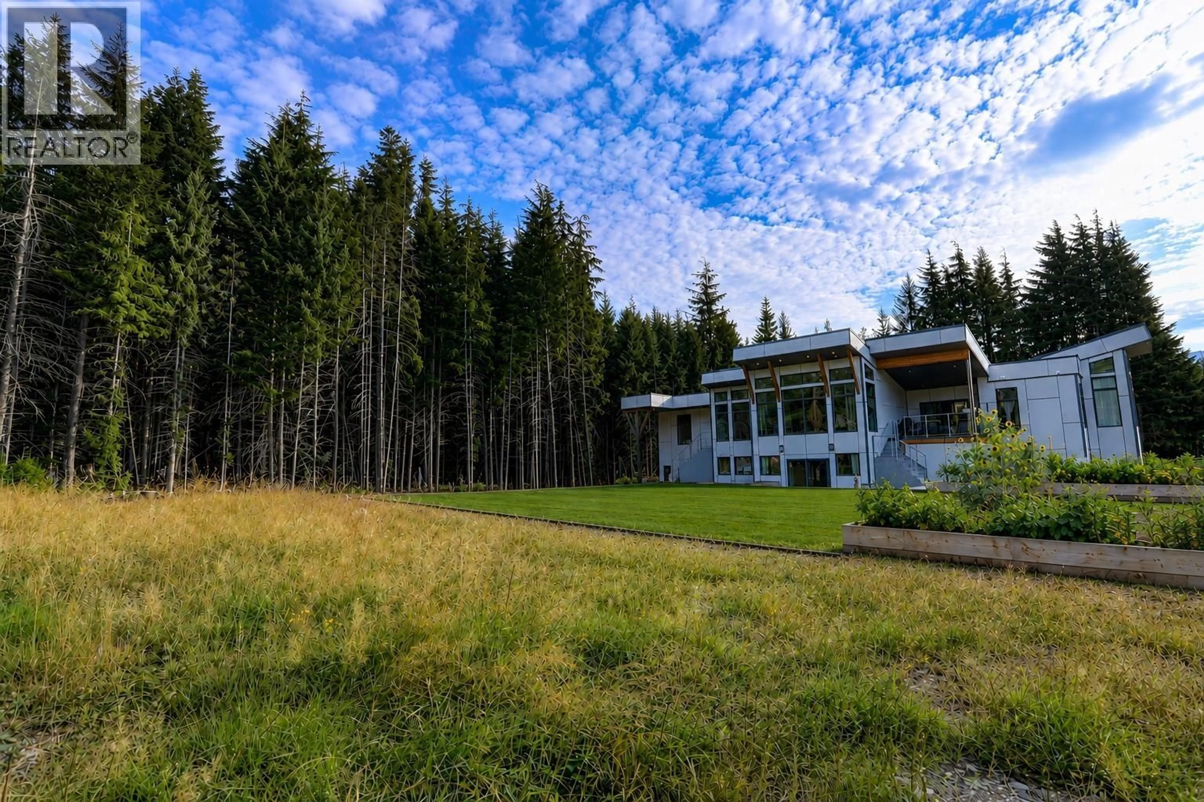 A pic from outside/outdoor area/front of a property/back of a property/a pic from drone, forest/trees view for 69 ELDERBERRY STREET, Kitimat British Columbia V8C0A9