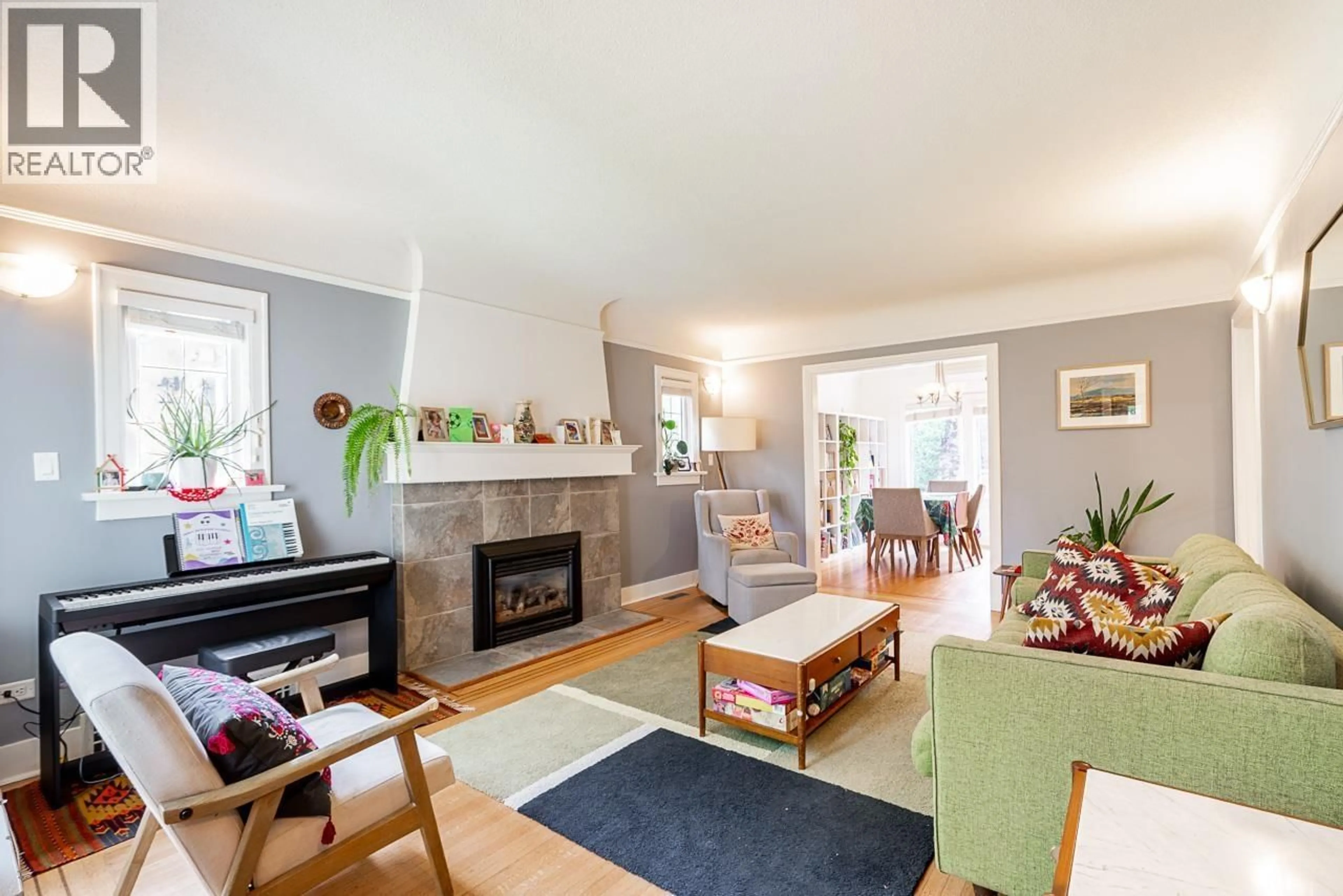 Living room with furniture, wood/laminate floor for 242 21ST AVENUE, Vancouver British Columbia V5Y2E5