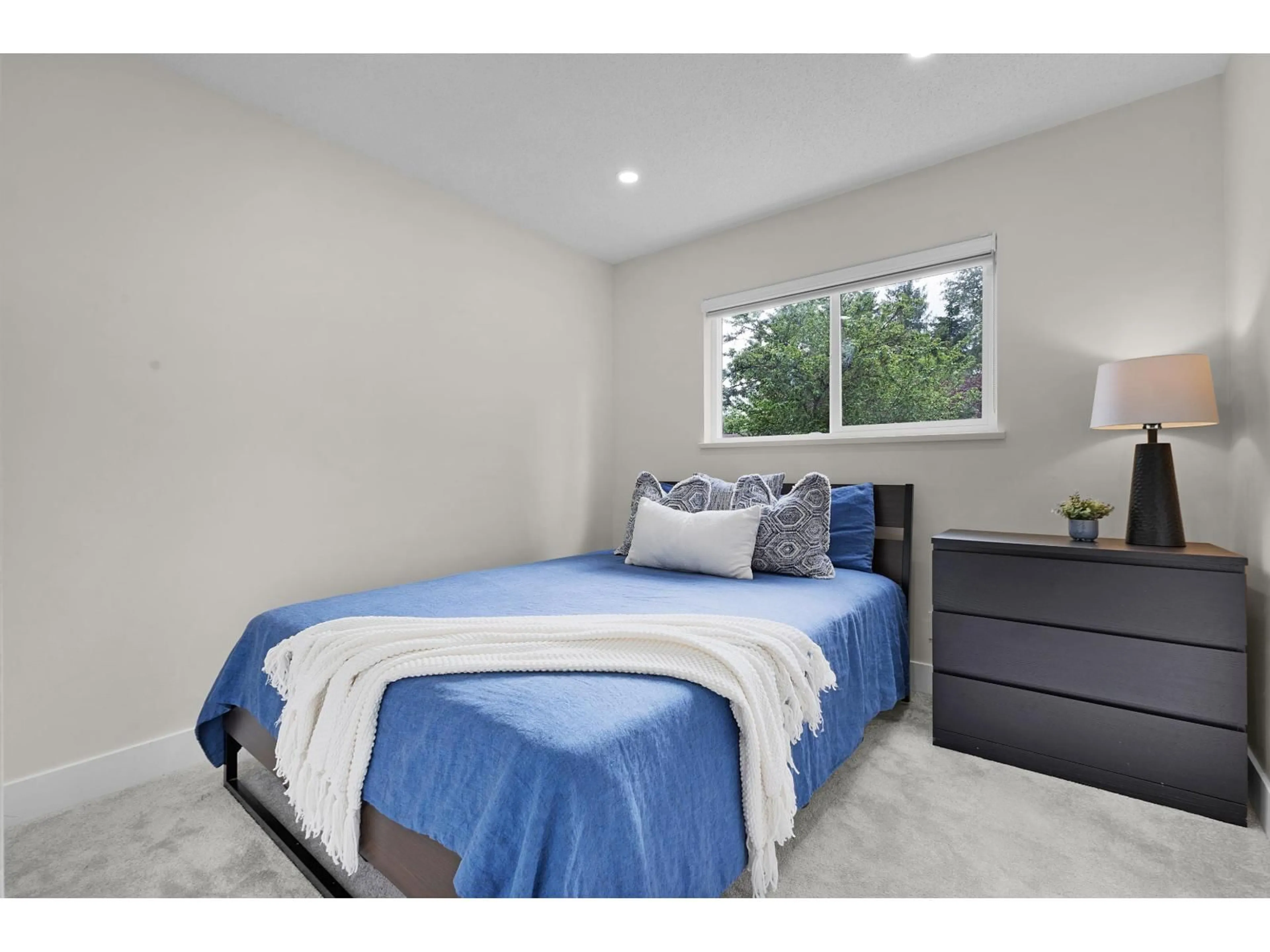 Bedroom with bed, wood/laminate floor for 9763 155 STREET, Surrey British Columbia V3R7G6