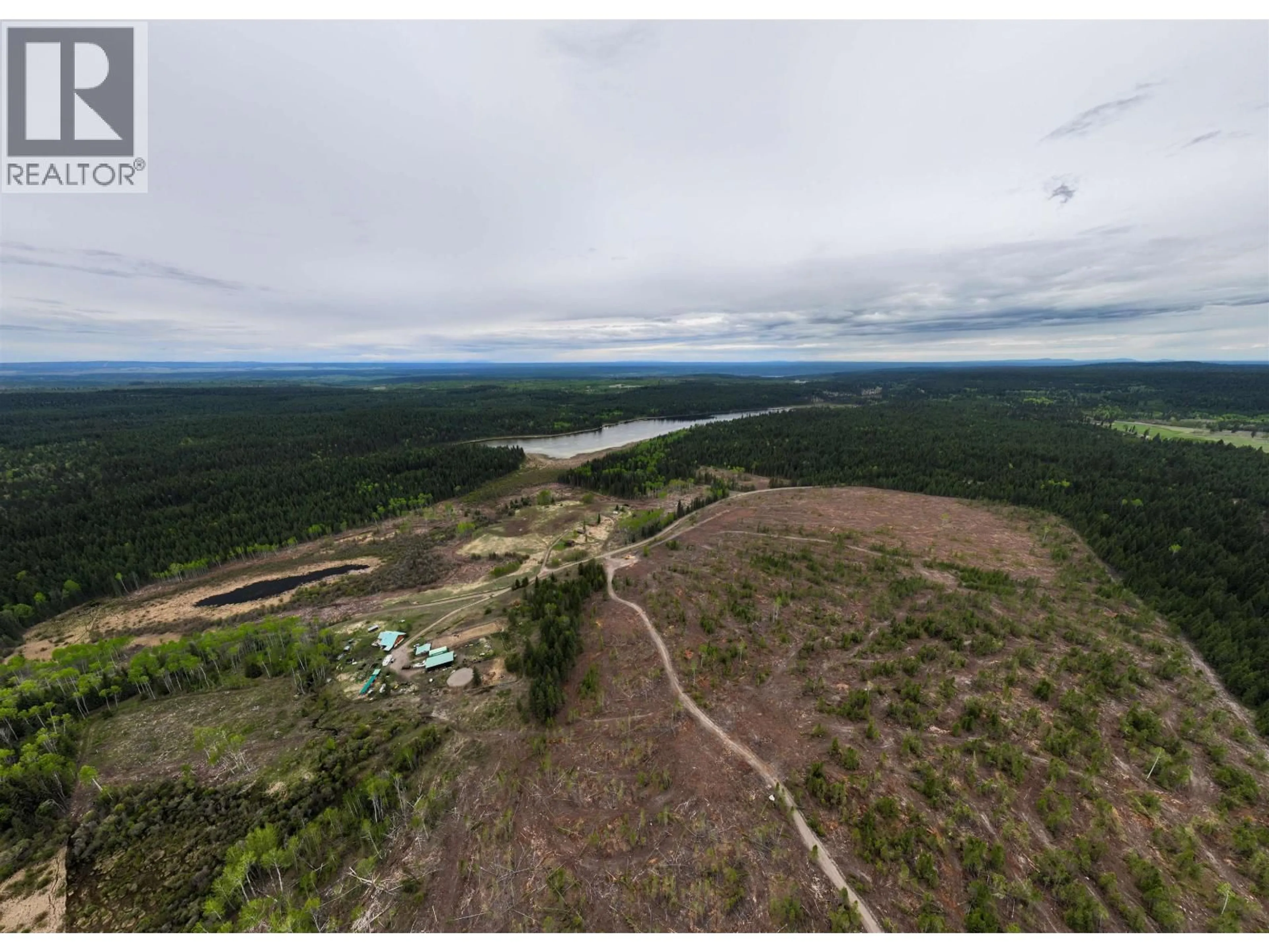 A pic from outside/outdoor area/front of a property/back of a property/a pic from drone, water/lake/river/ocean view for 3711 WHITEHORSE LAKE ROAD, Lac La Hache British Columbia V0K1T0