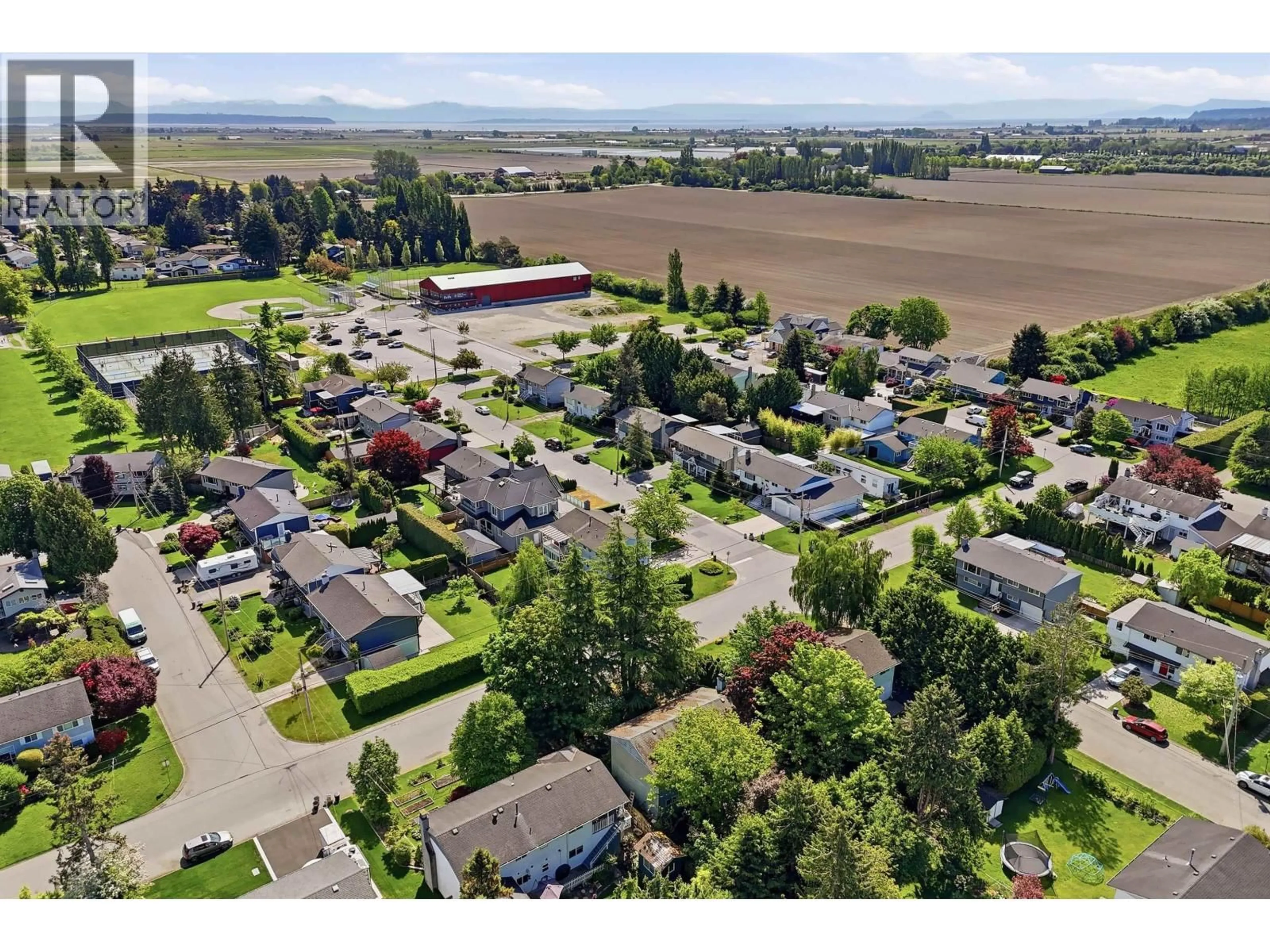 A pic from outside/outdoor area/front of a property/back of a property/a pic from drone, mountain view for 4283 48B STREET, Delta British Columbia V4K2R3