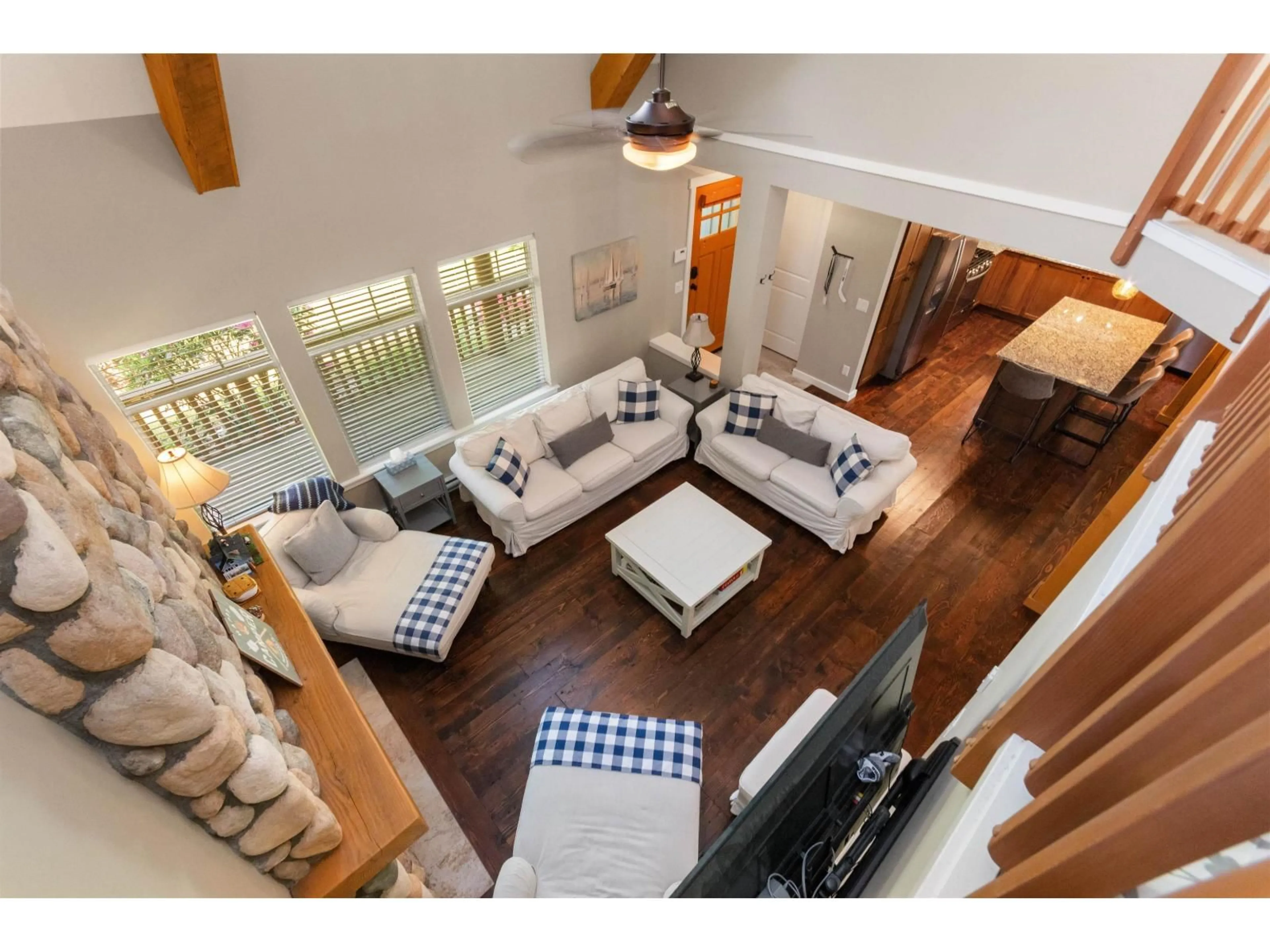 Living room with furniture, wood/laminate floor for 1730 RAVENWOOD TRAIL, Lindell Beach British Columbia V2R0E1