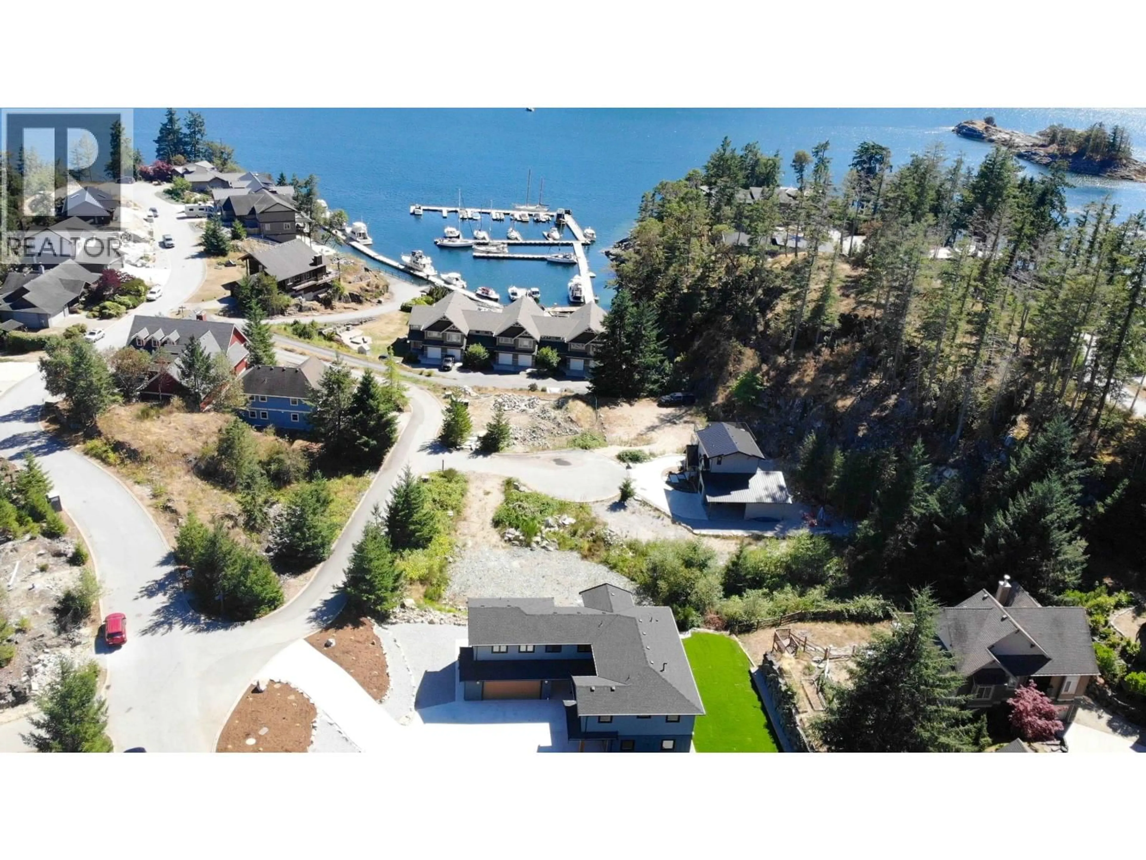 A pic from outside/outdoor area/front of a property/back of a property/a pic from drone, water/lake/river/ocean view for 44 - 4622 SINCLAIR BAY ROAD, Pender Harbour British Columbia V0N1S1
