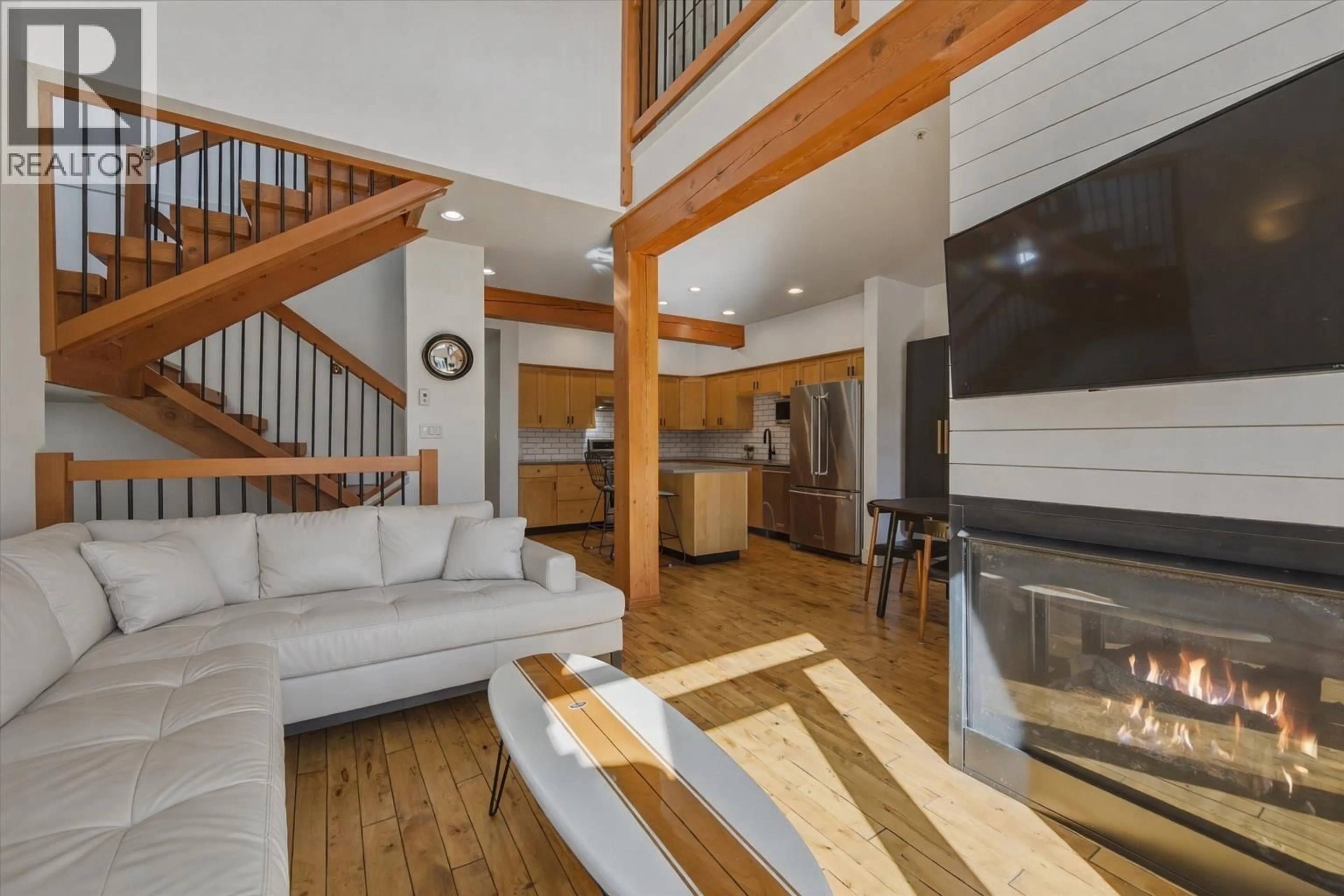 Living room with furniture, wood/laminate floor for 22 - 39758 GOVERNMENT ROAD, Squamish British Columbia V8B0G3