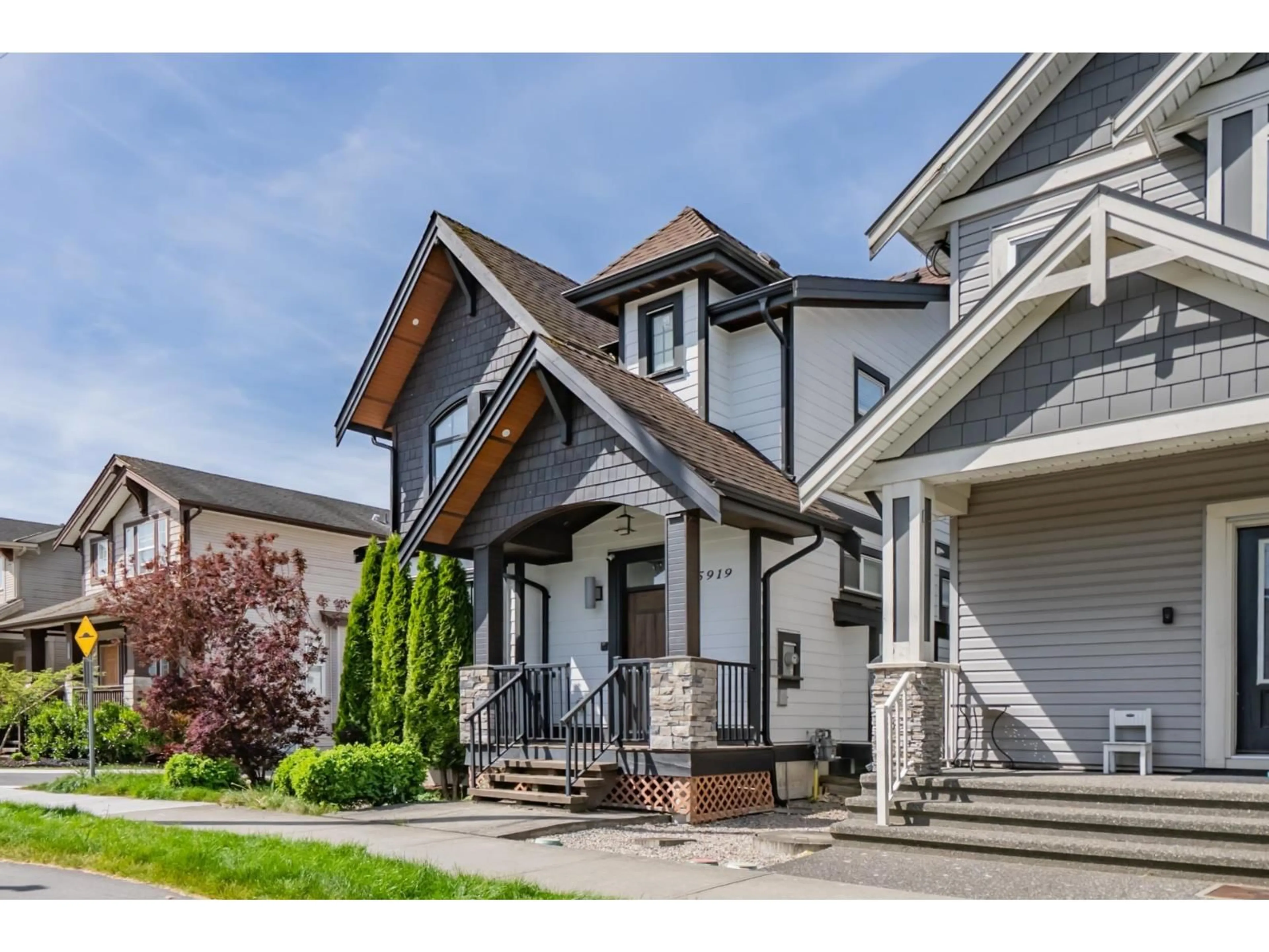 Home with vinyl exterior material, street for 5919 148 STREET, Surrey British Columbia V3S6V2
