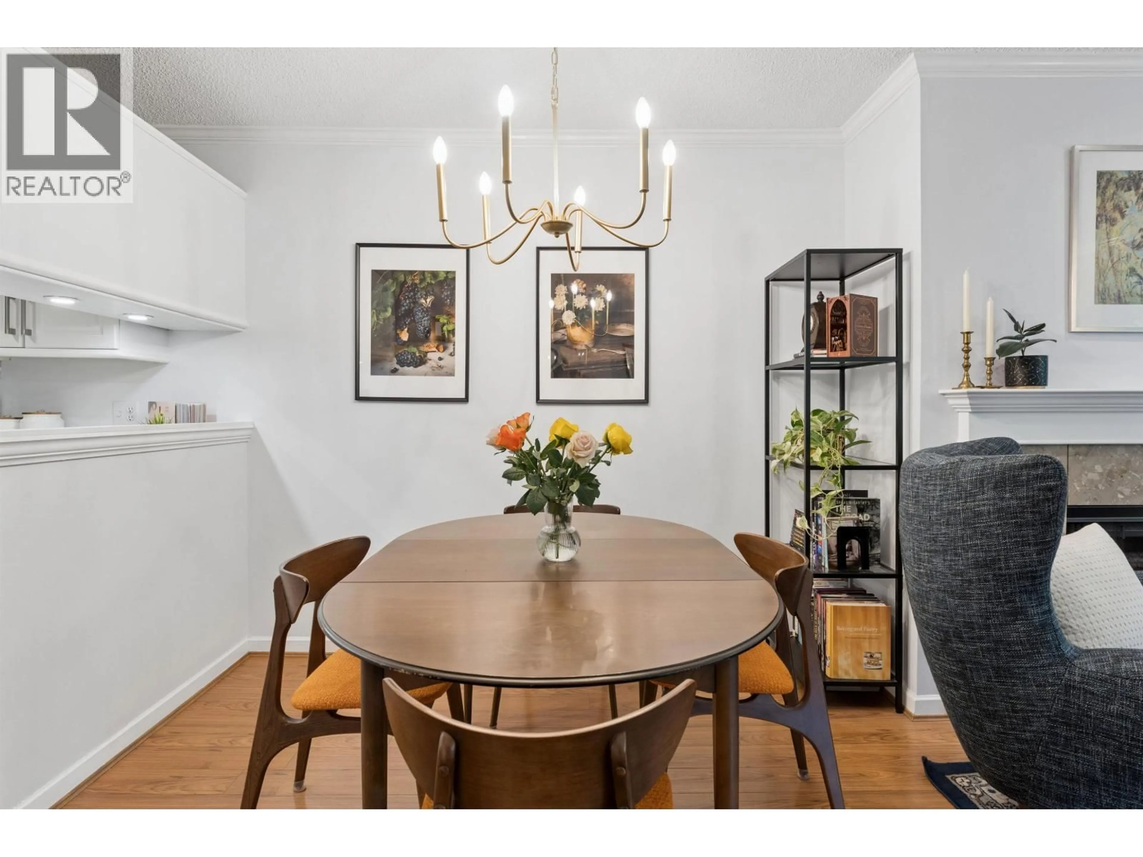 Dining room, wood/laminate floor for 105 - 2256 7TH AVENUE, Vancouver British Columbia V6K1Y2