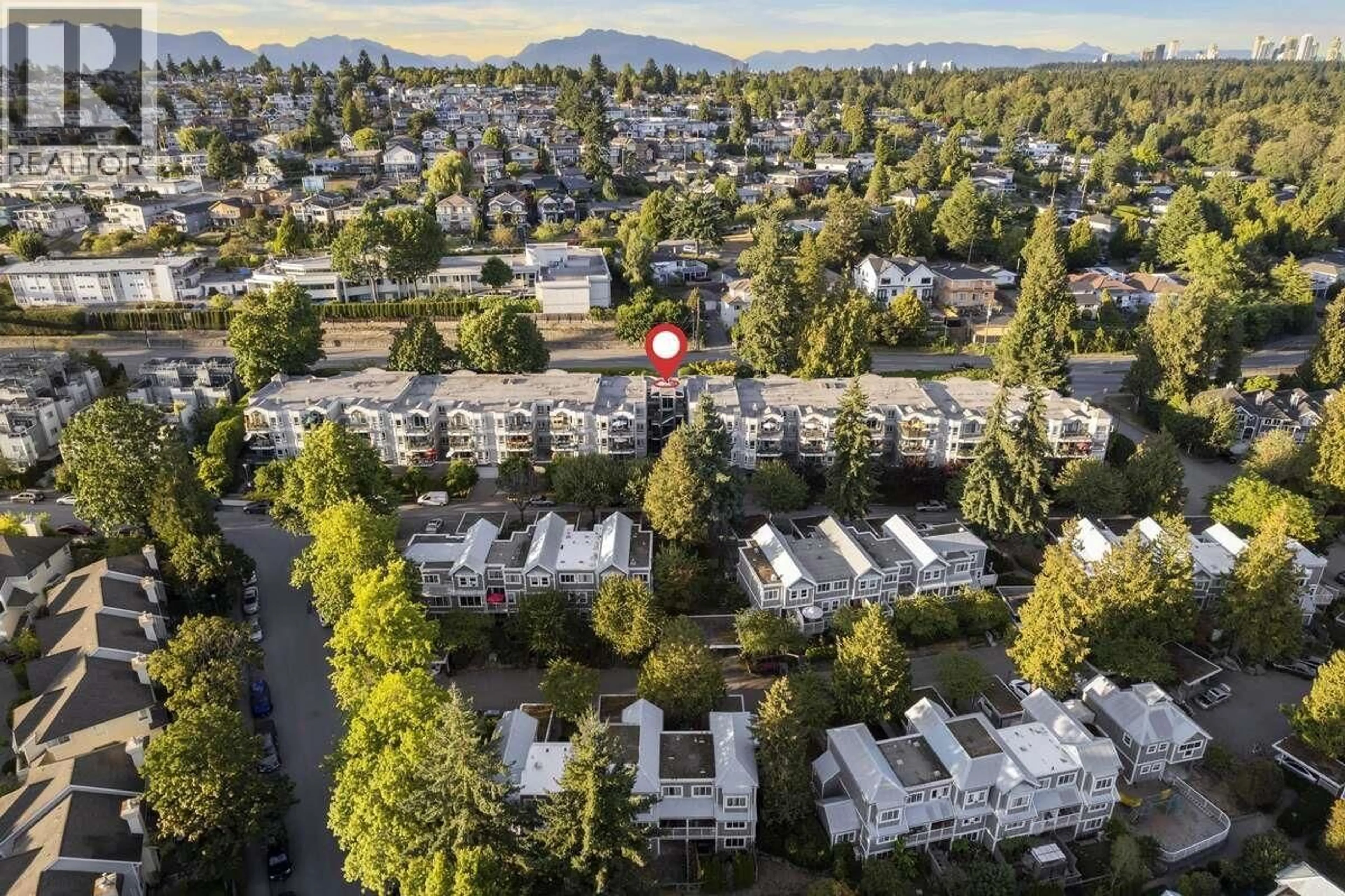 A pic from outside/outdoor area/front of a property/back of a property/a pic from drone, mountain view for 202 - 2250 MARINE DRIVE, Vancouver British Columbia V5P2S2