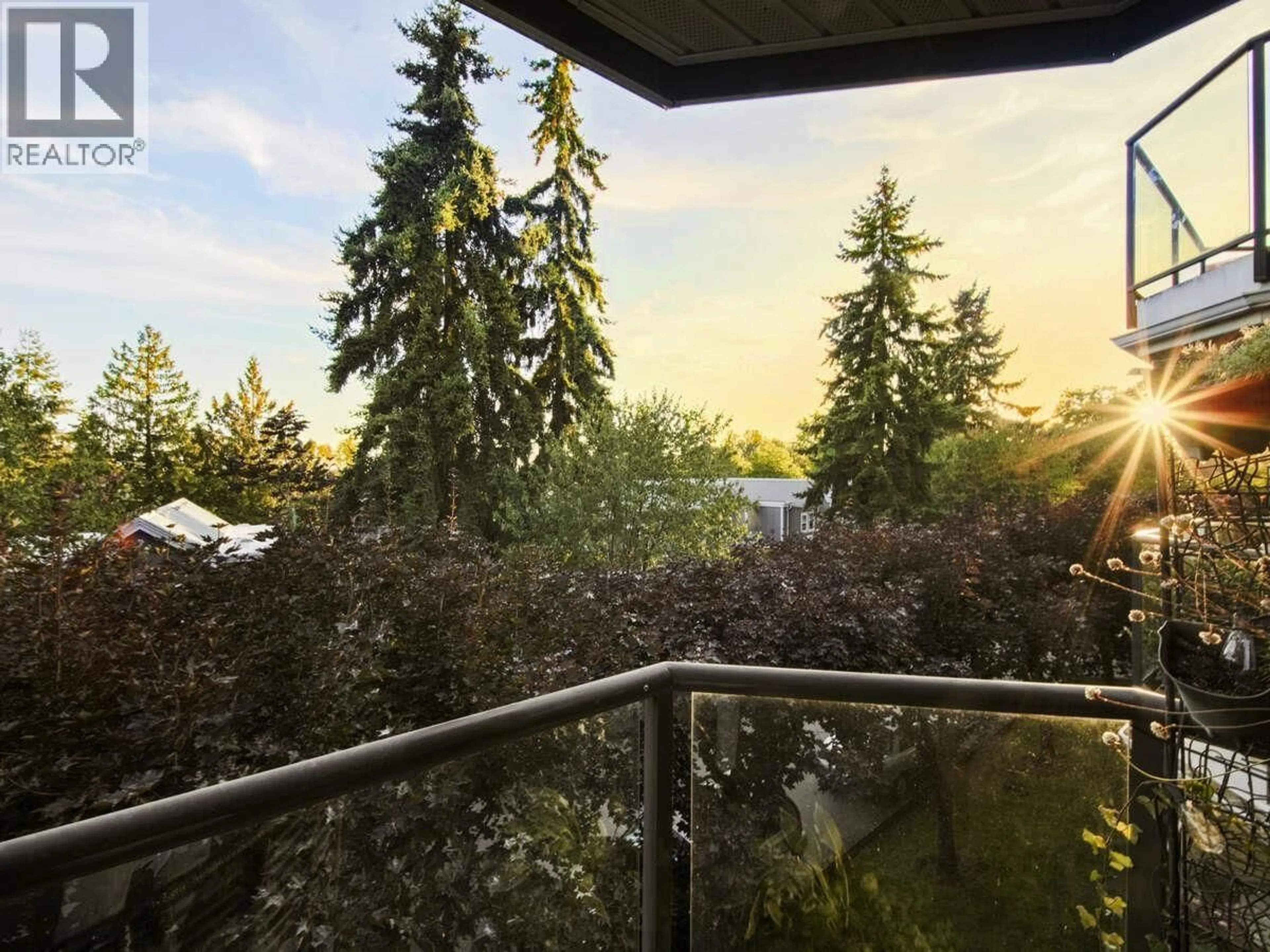 Balcony in the apartment, forest/trees view for 202 - 2250 MARINE DRIVE, Vancouver British Columbia V5P2S2