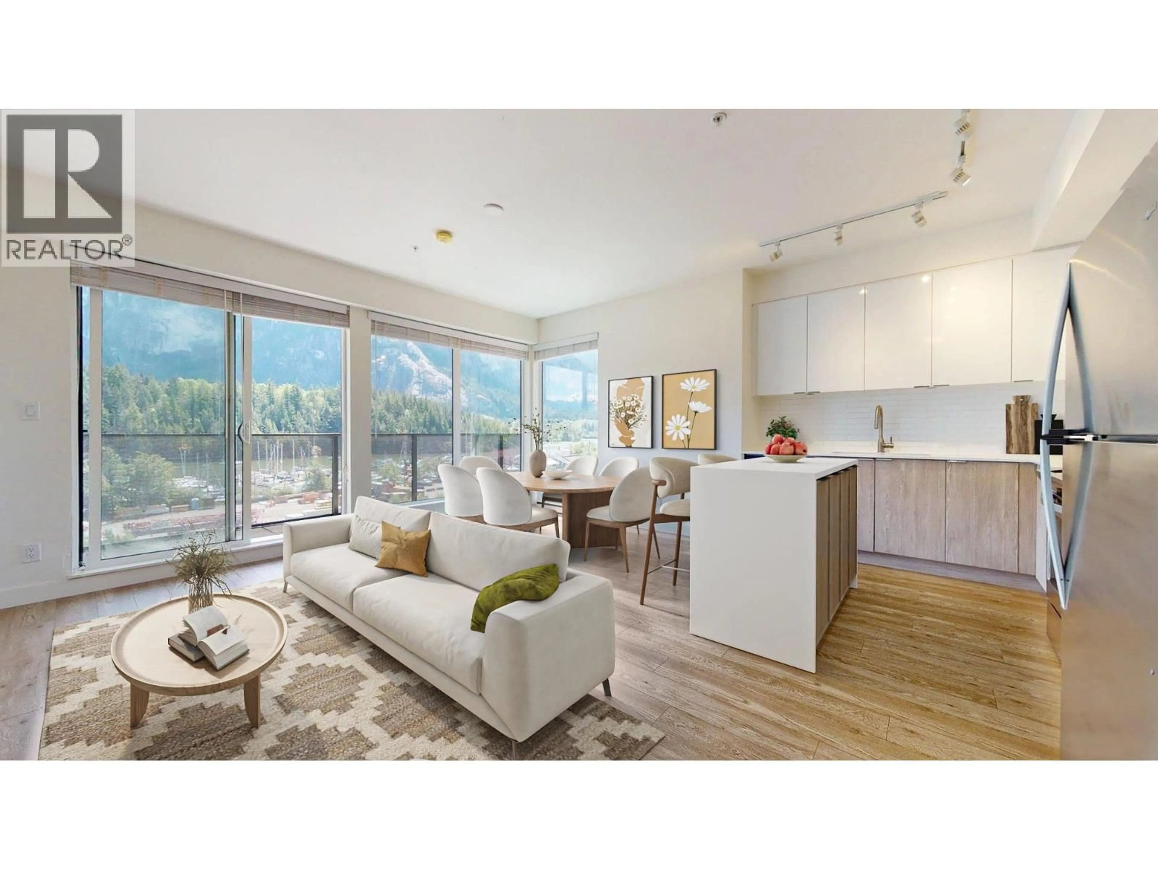 Open concept kitchen, wood/laminate floor for 604 - 37881 CLEVELAND AVENUE, Squamish British Columbia V8B0Z7