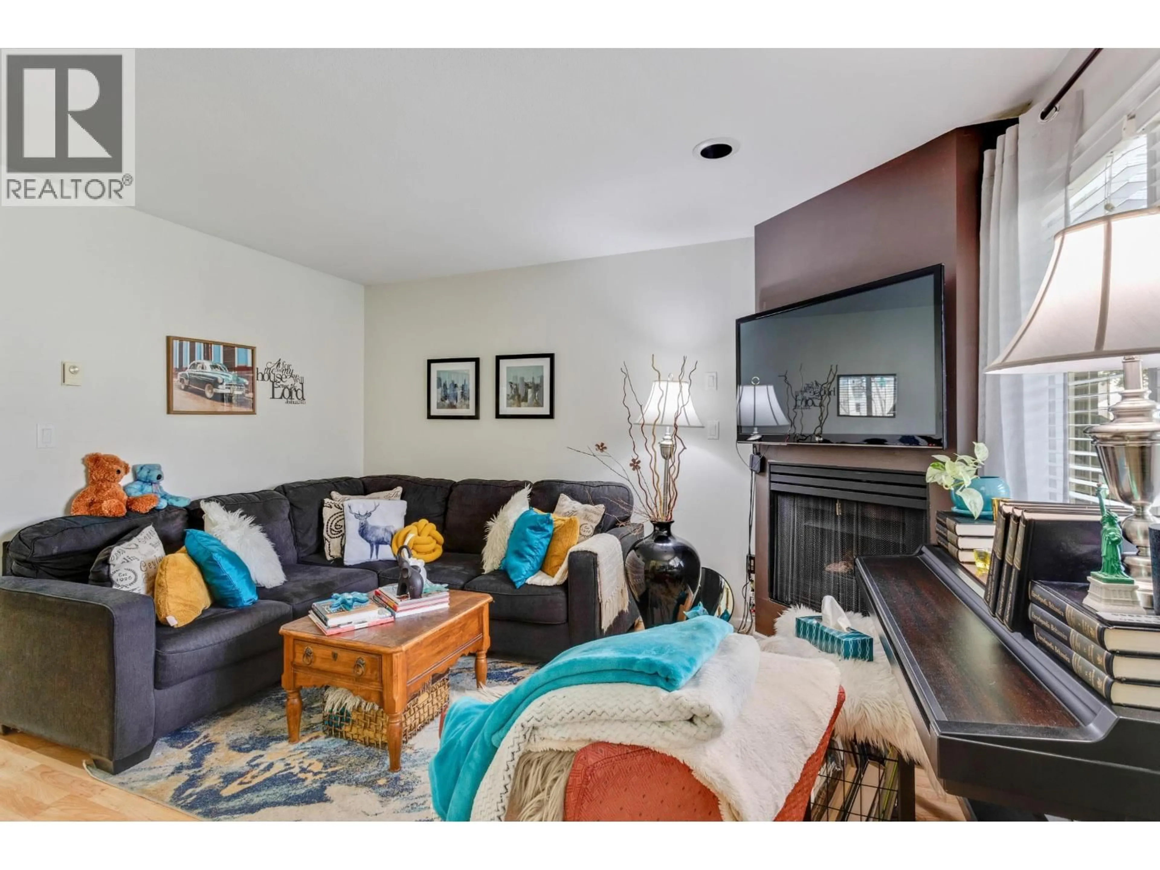 Living room with furniture, unknown for 205 - 1518 BOWSER AVENUE, North Vancouver British Columbia V7P2Y3