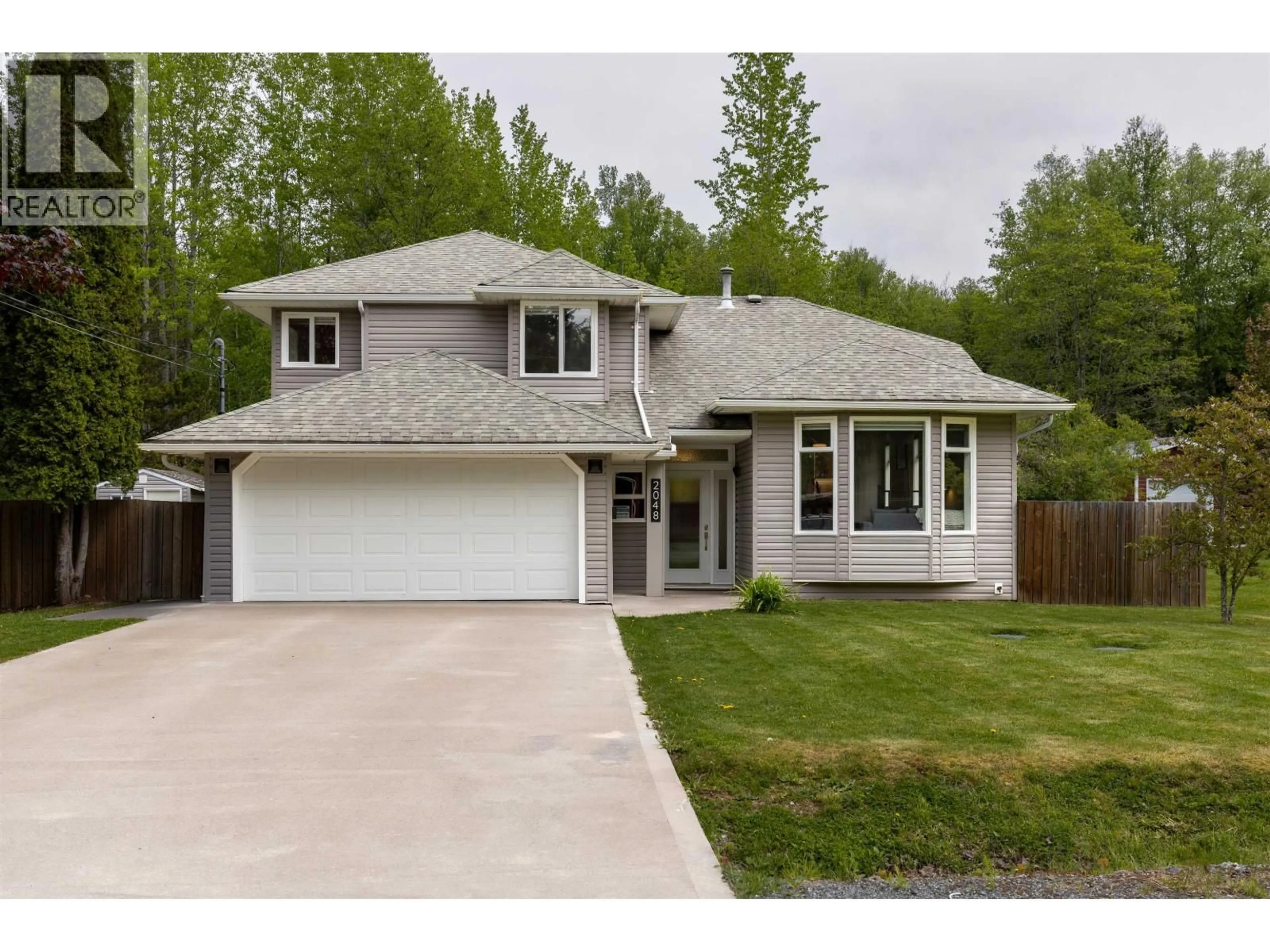 Home with vinyl exterior material, street for 2048 CHURCHILL DRIVE, Terrace British Columbia V8G0E8