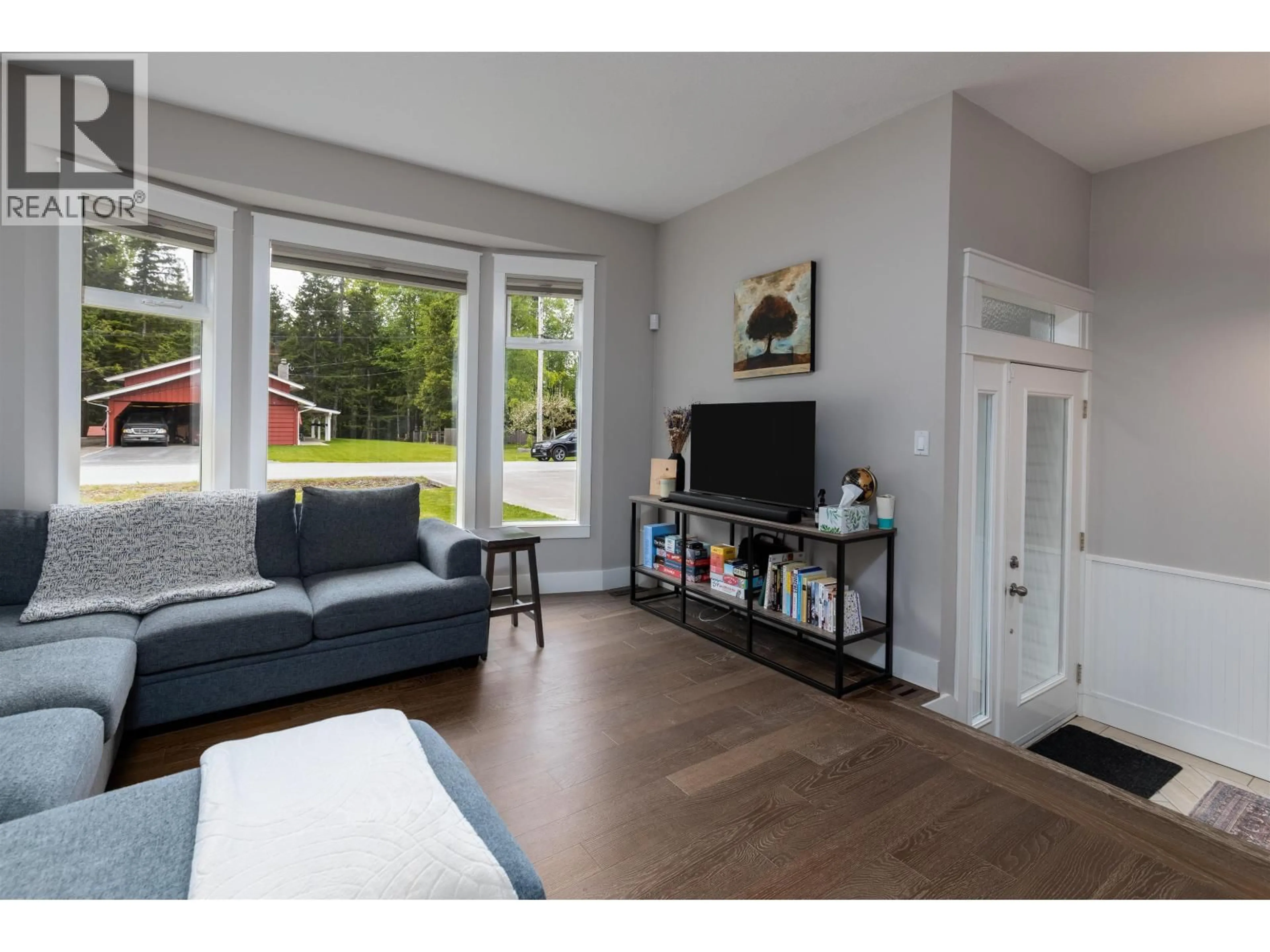 Living room with furniture, wood/laminate floor for 2048 CHURCHILL DRIVE, Terrace British Columbia V8G0E8