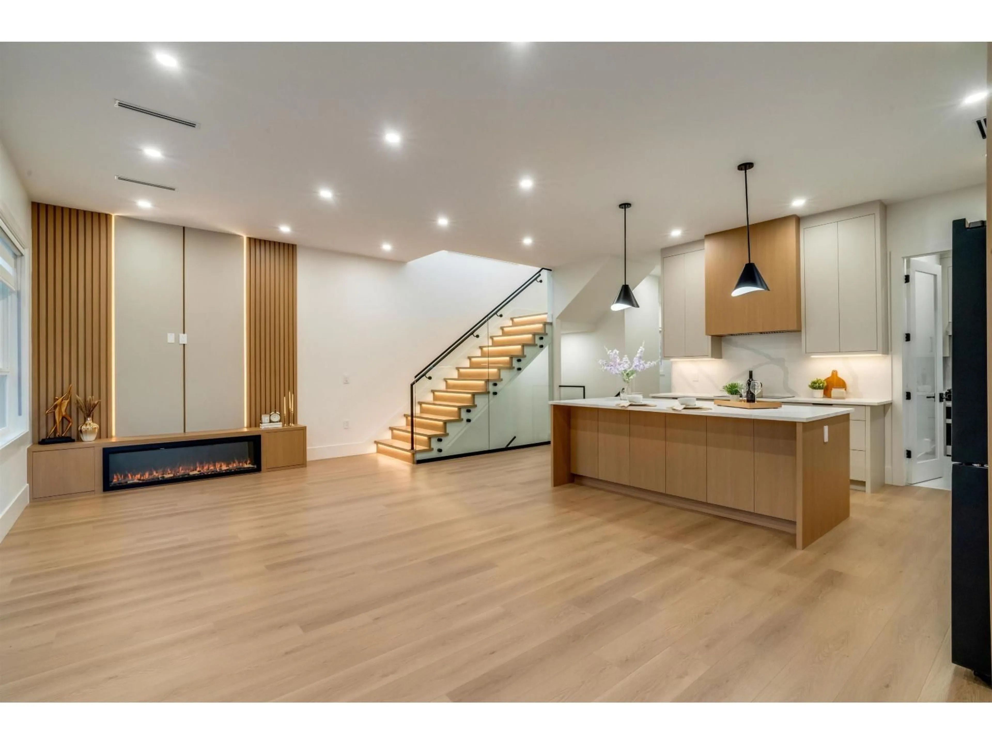 Open concept kitchen, wood/laminate floor for 11772 92 AVENUE, Delta British Columbia V4C3L4
