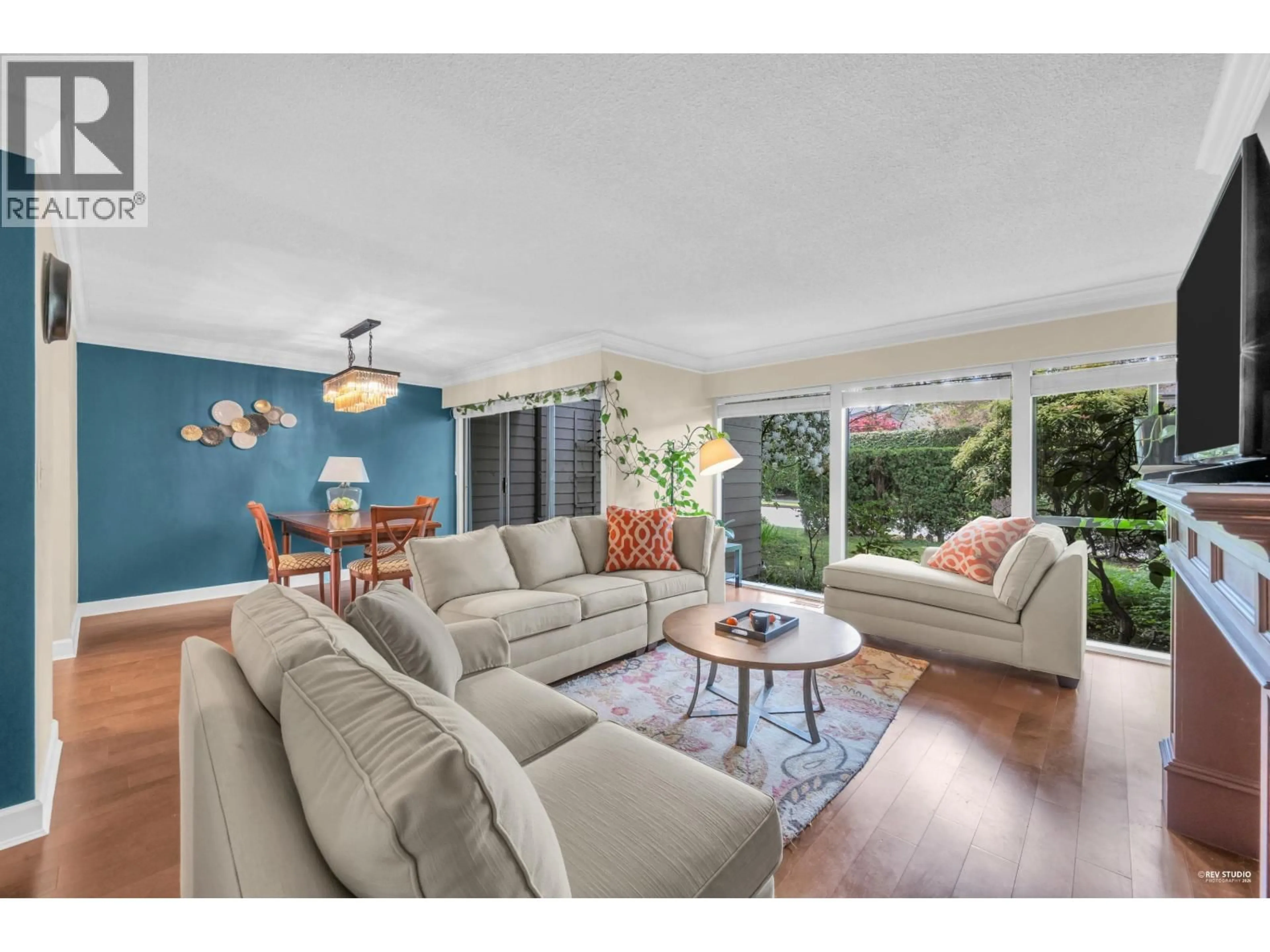 Living room with furniture, wood/laminate floor for 2143 MCMULLEN AVENUE, Vancouver British Columbia V6L3B3