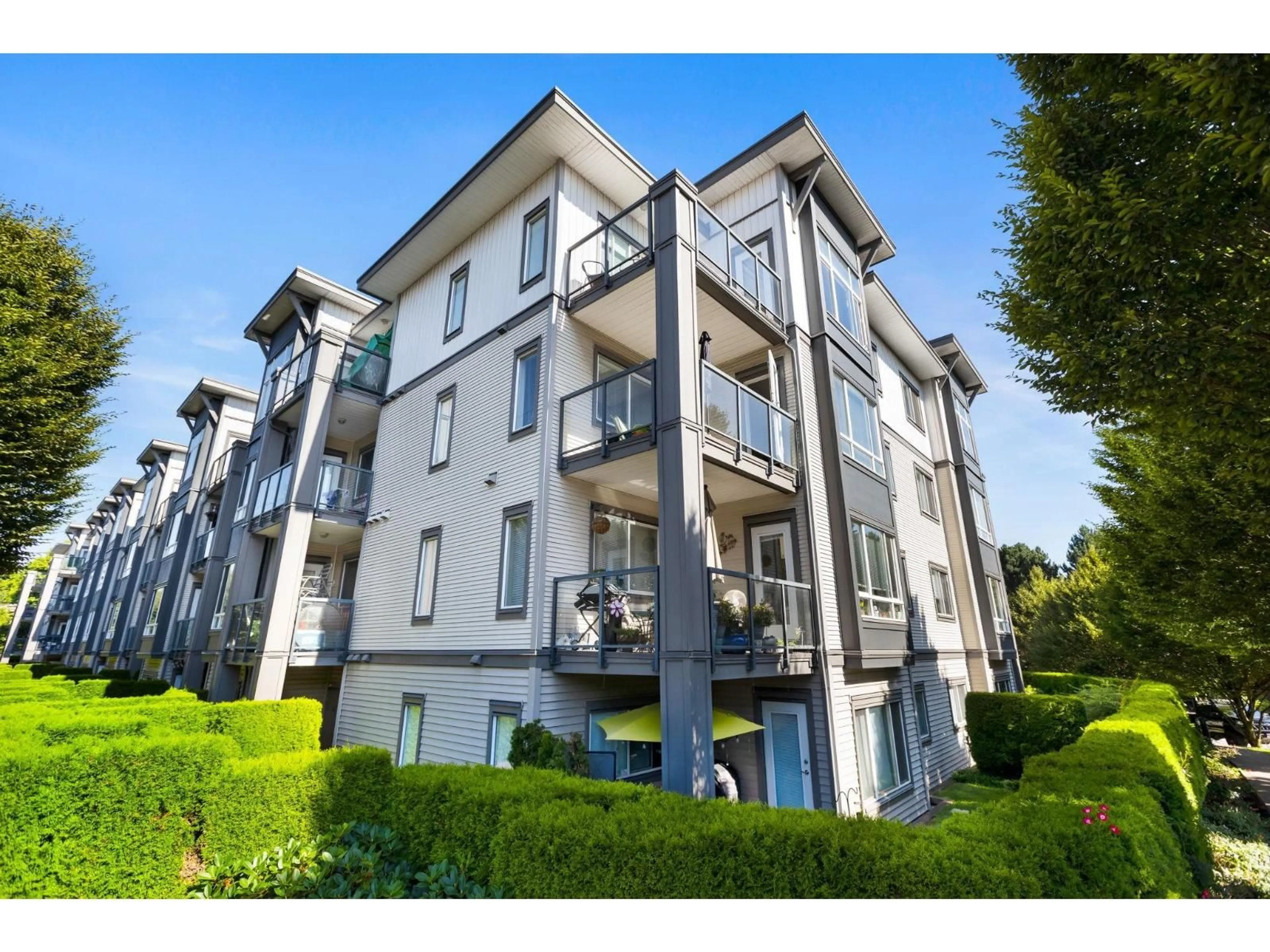 A pic from outside/outdoor area/front of a property/back of a property/a pic from drone, unknown for 306 - 2943 NELSON PLACE, Abbotsford British Columbia V2S0C8