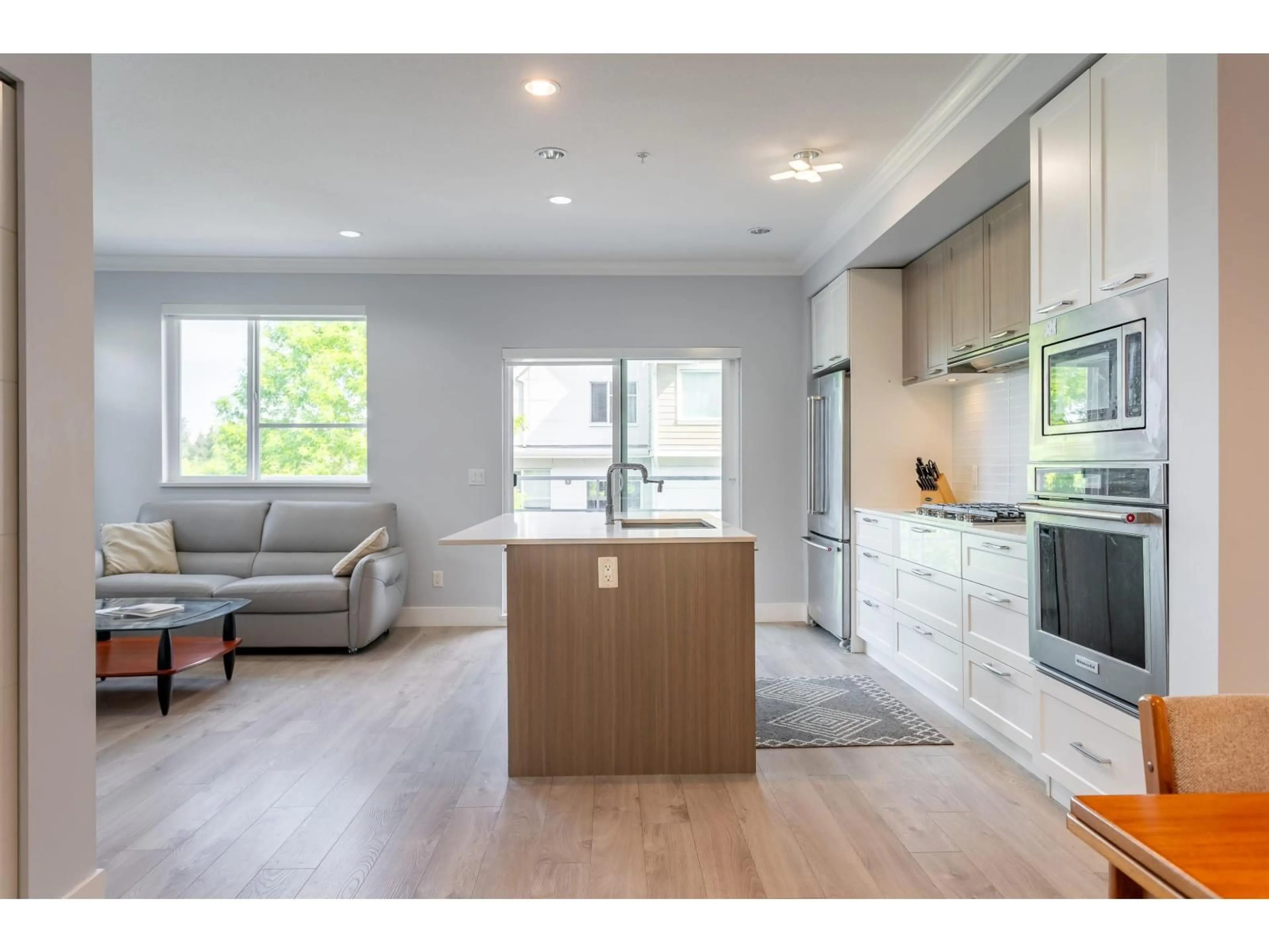 Open concept kitchen, wood/laminate floor for 1 - 2978 159 STREET, Surrey British Columbia V3Z0R1