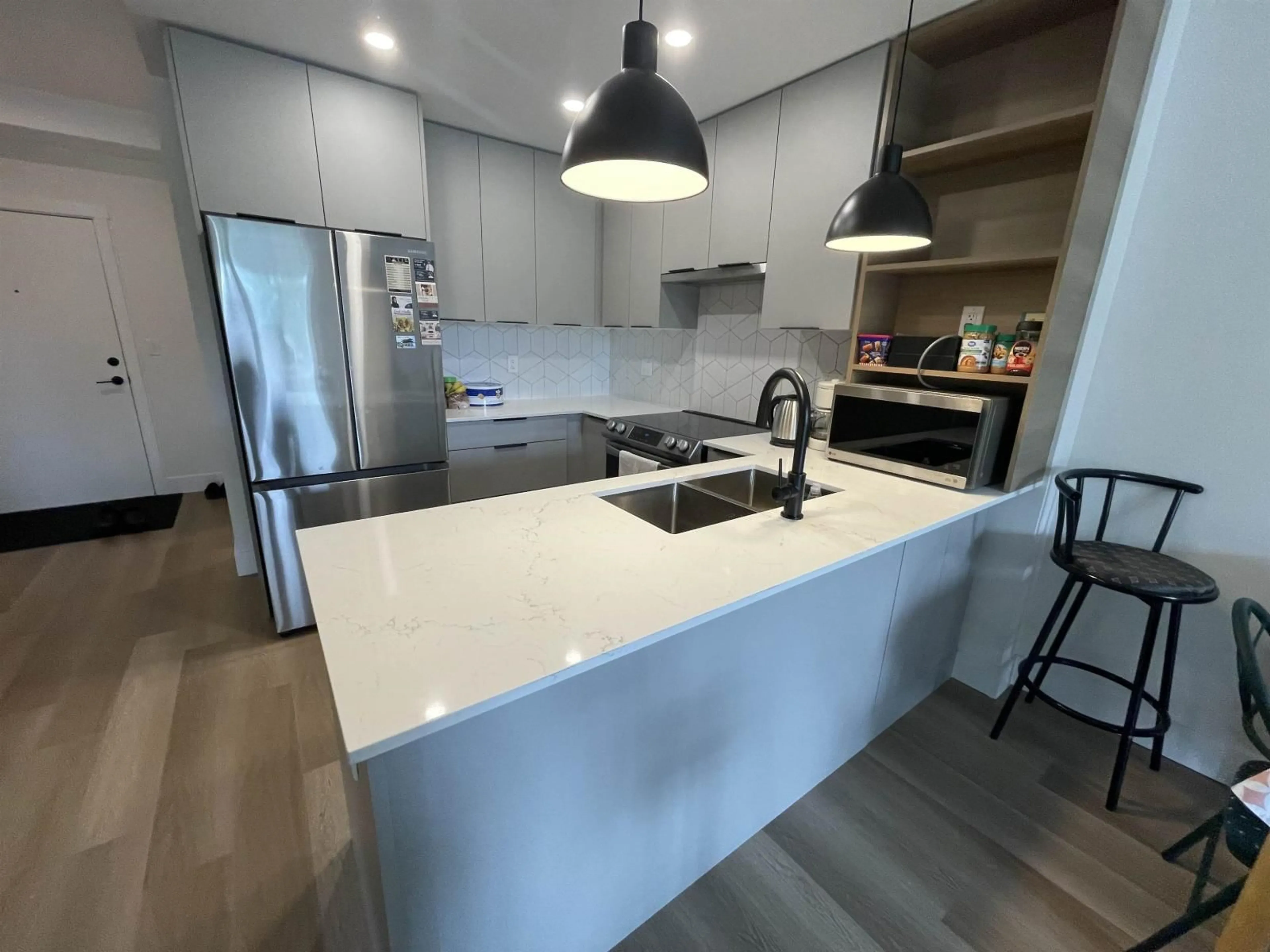 Open concept kitchen, unknown for 210 - 10778 138 STREET, Surrey British Columbia V3T0S5