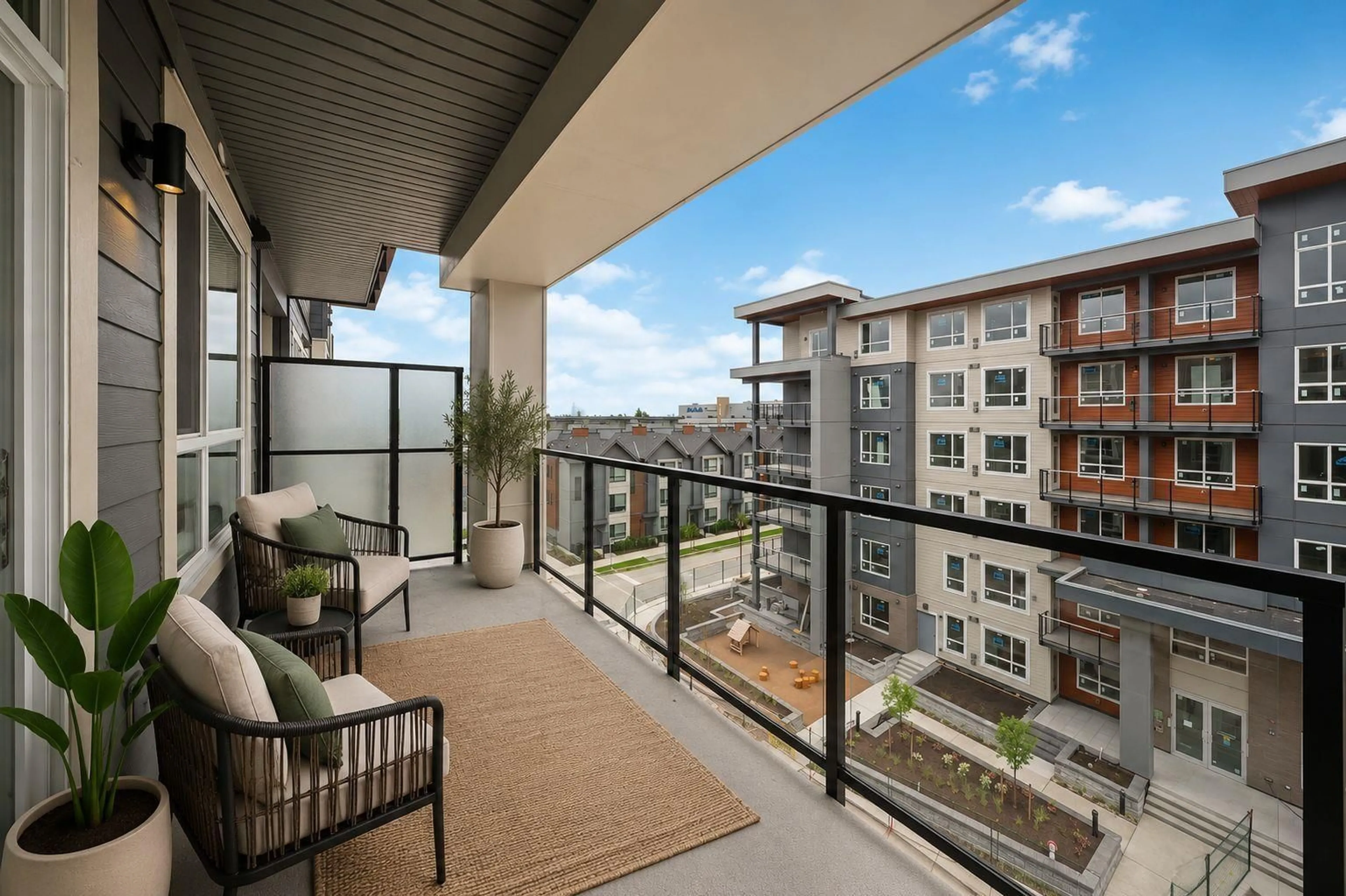 Patio, city buildings view from balcony for 313 - 30490 CARDINAL AVENUE, Abbotsford British Columbia V3T1K6