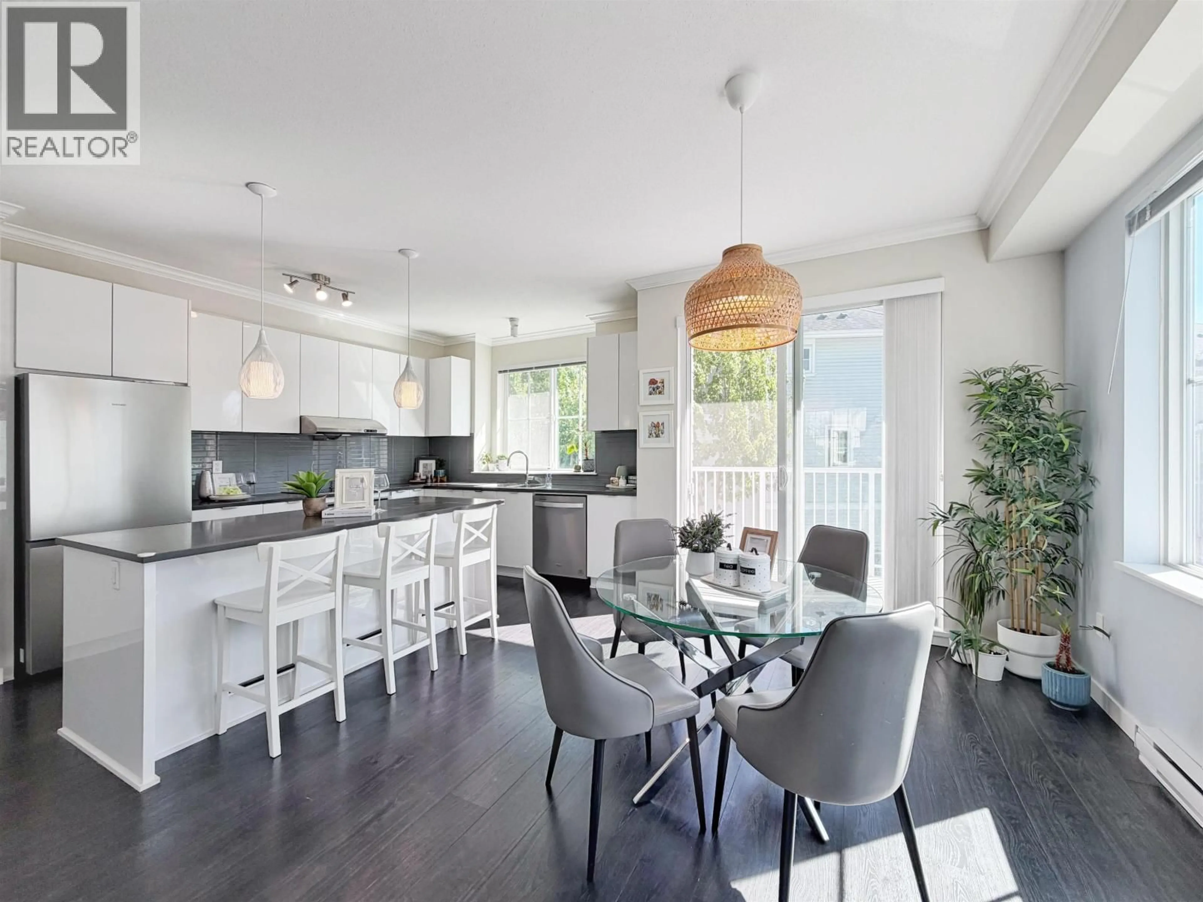 Open concept kitchen, wood/laminate floor for 121 - 5550 ADMIRAL WAY, Ladner British Columbia V4K0C4