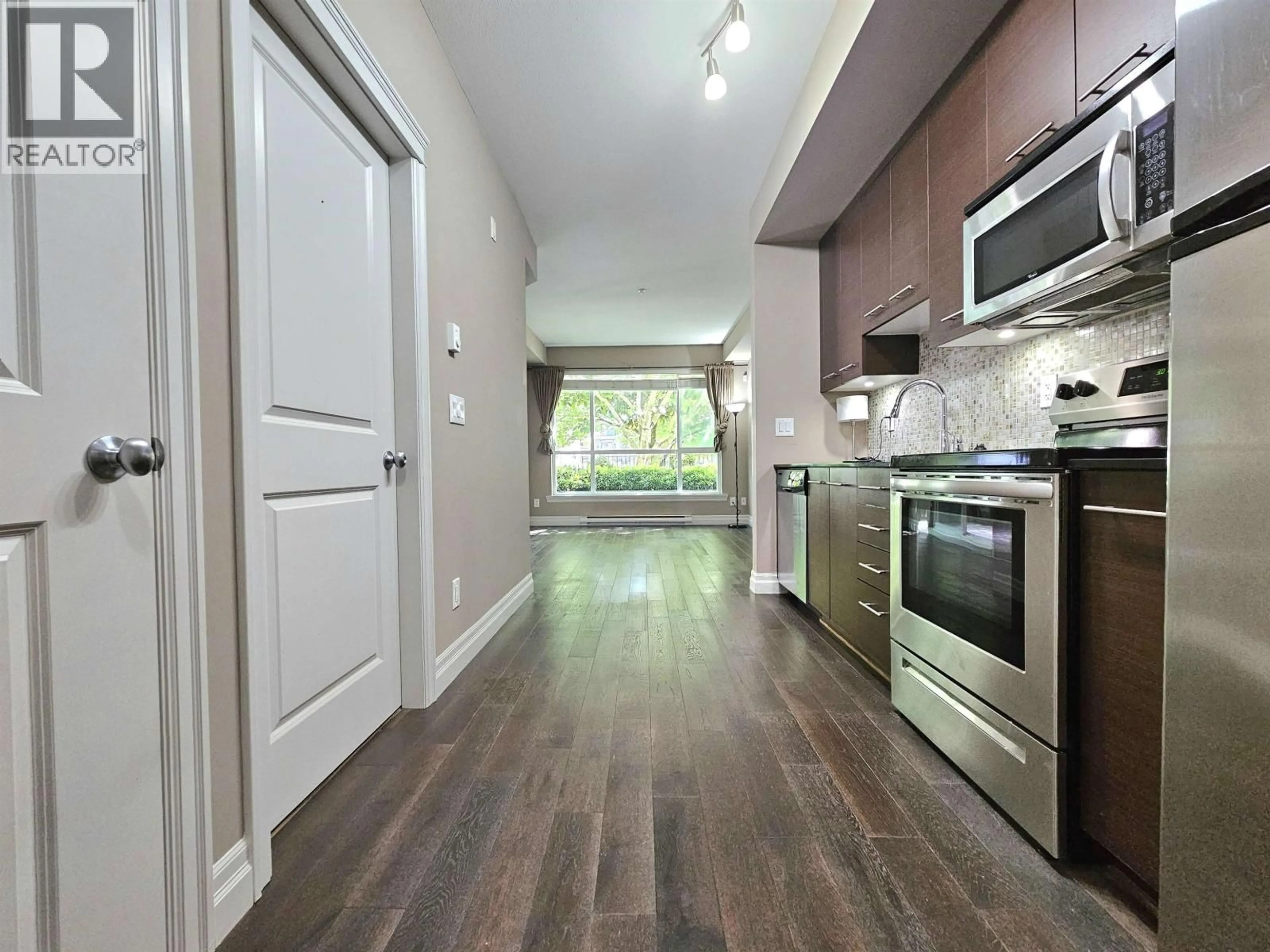 Open concept kitchen, wood/laminate floor for 110 - 2343 ATKINS AVENUE, Port Coquitlam British Columbia V3C1Y7