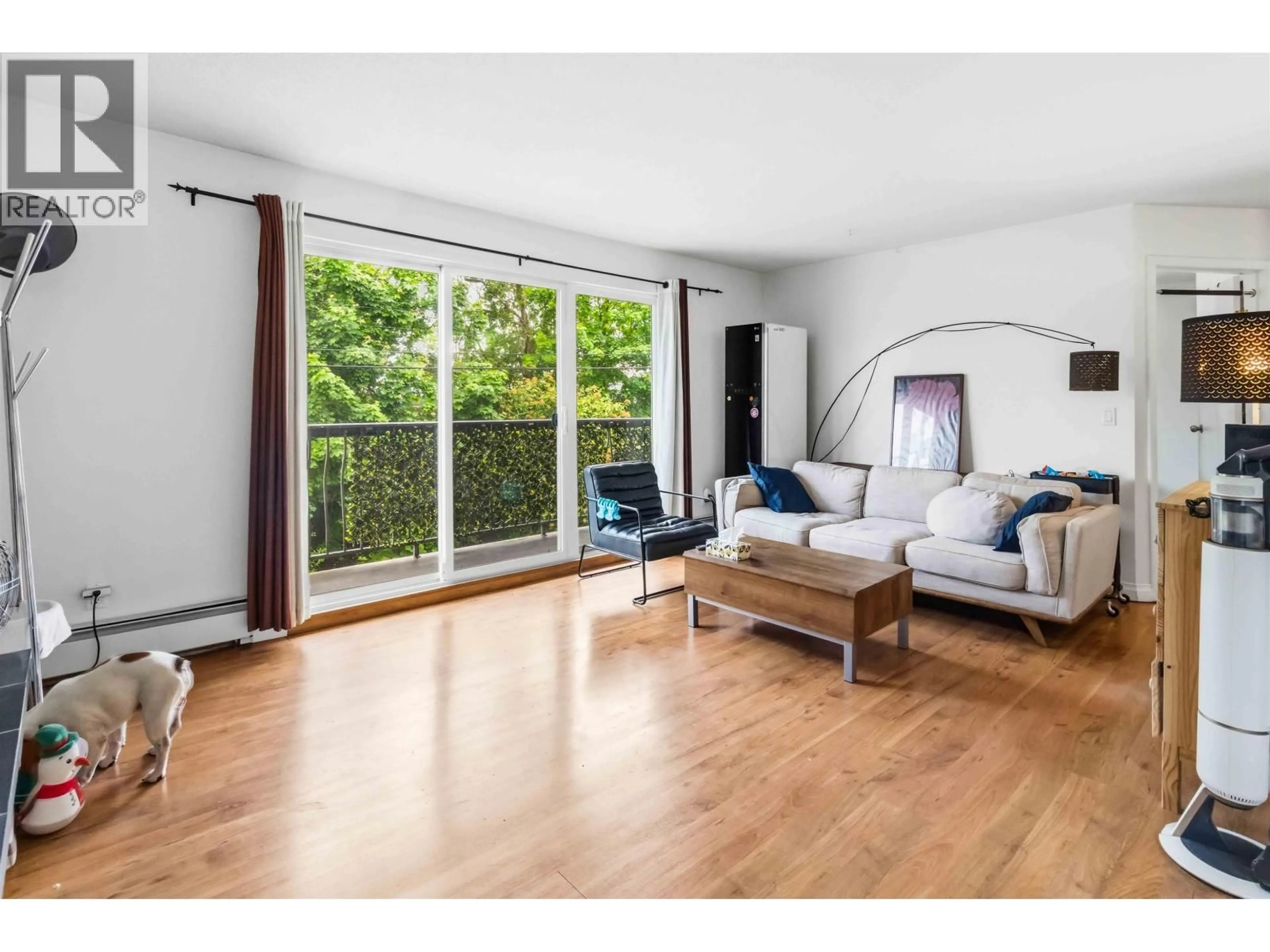 Living room with furniture, wood/laminate floor for 206 - 1334 73RD AVENUE, Vancouver British Columbia V6P3E7