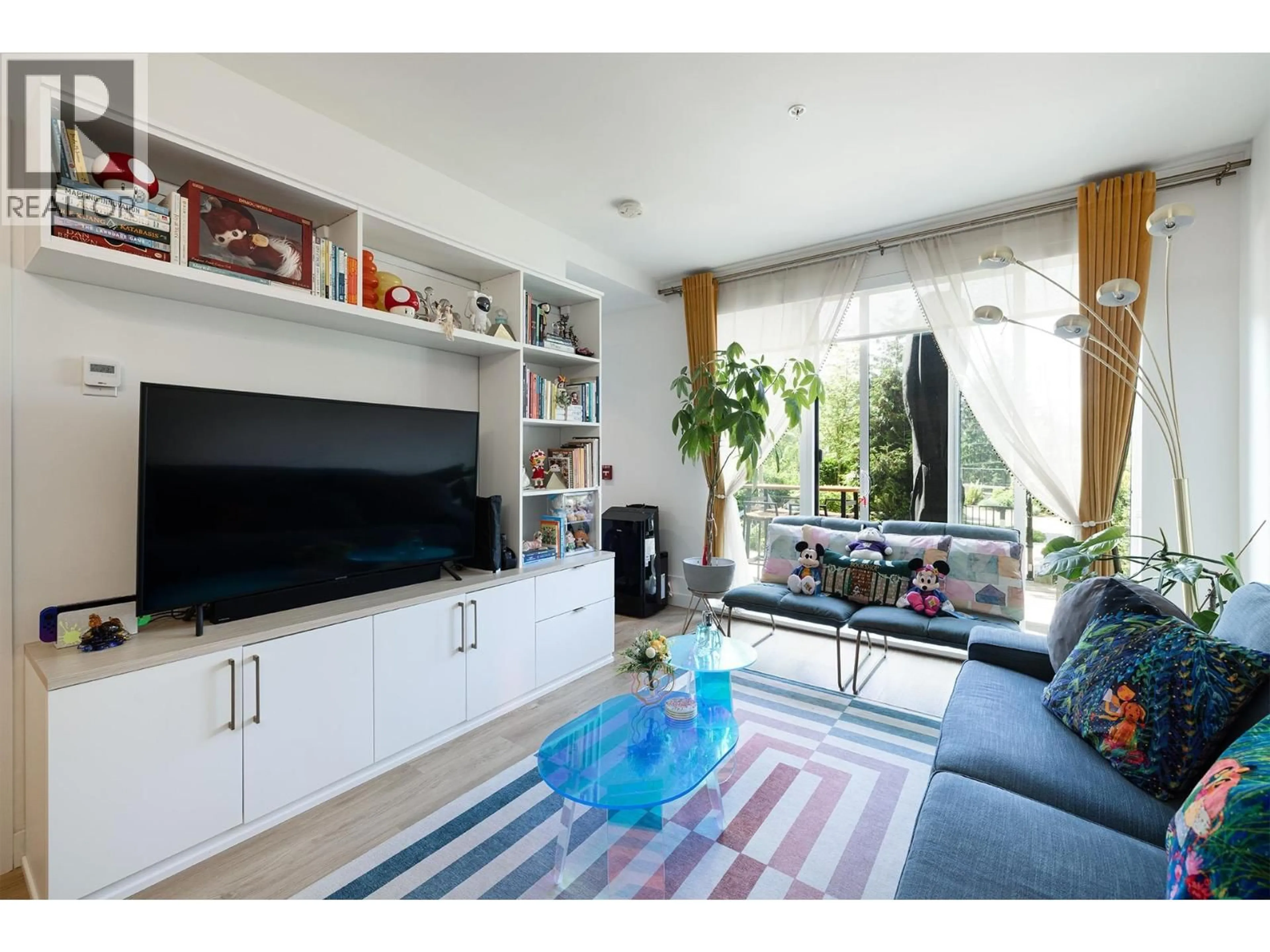 Living room with furniture, unknown for 208 - 9888 UNIVERSITY CRESCENT, Burnaby British Columbia V5A0G4